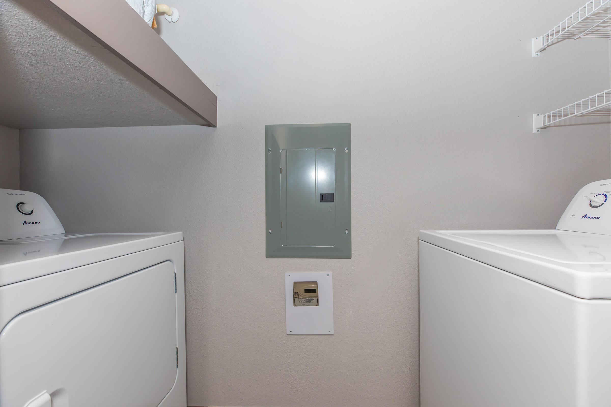 a kitchen with a sink and a refrigerator