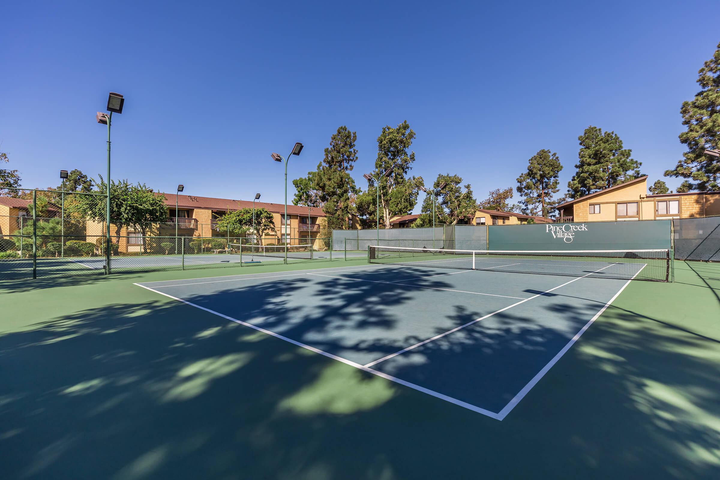 Pinecreek Village Apartments tennis court