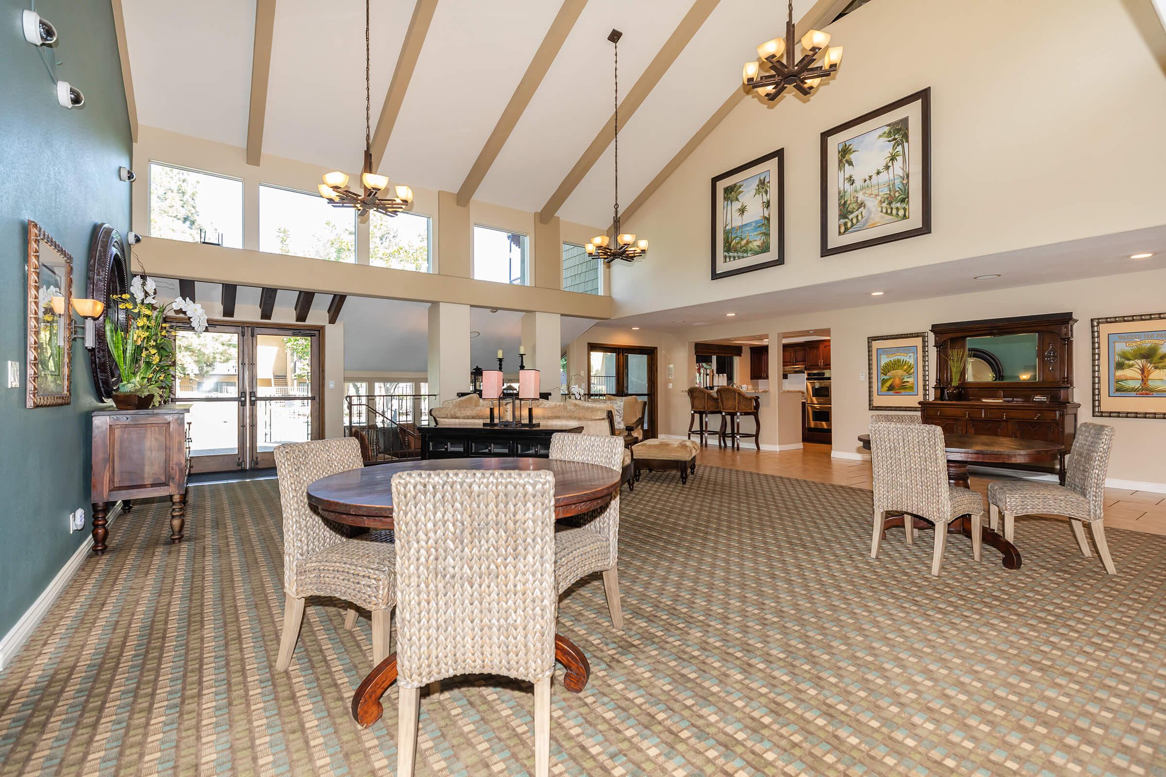 Community room filled with furniture 