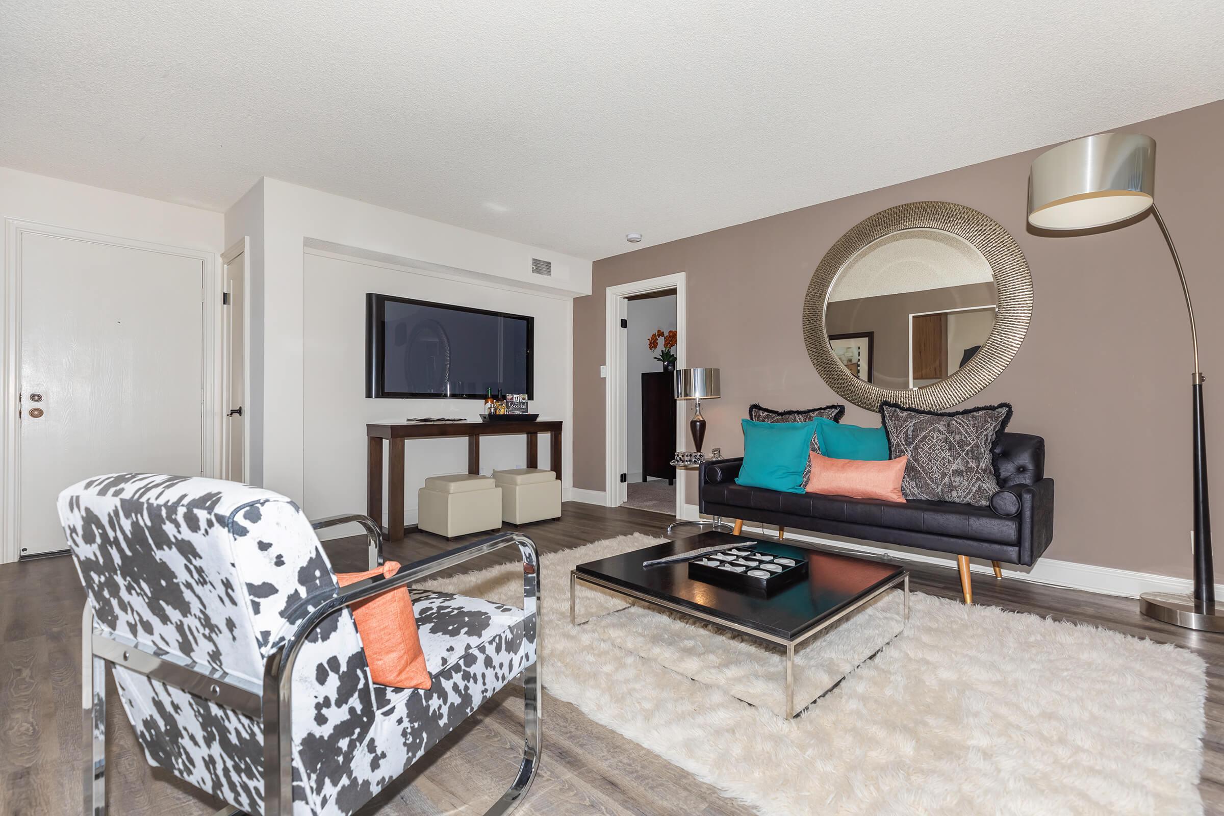 Living room with a white rug