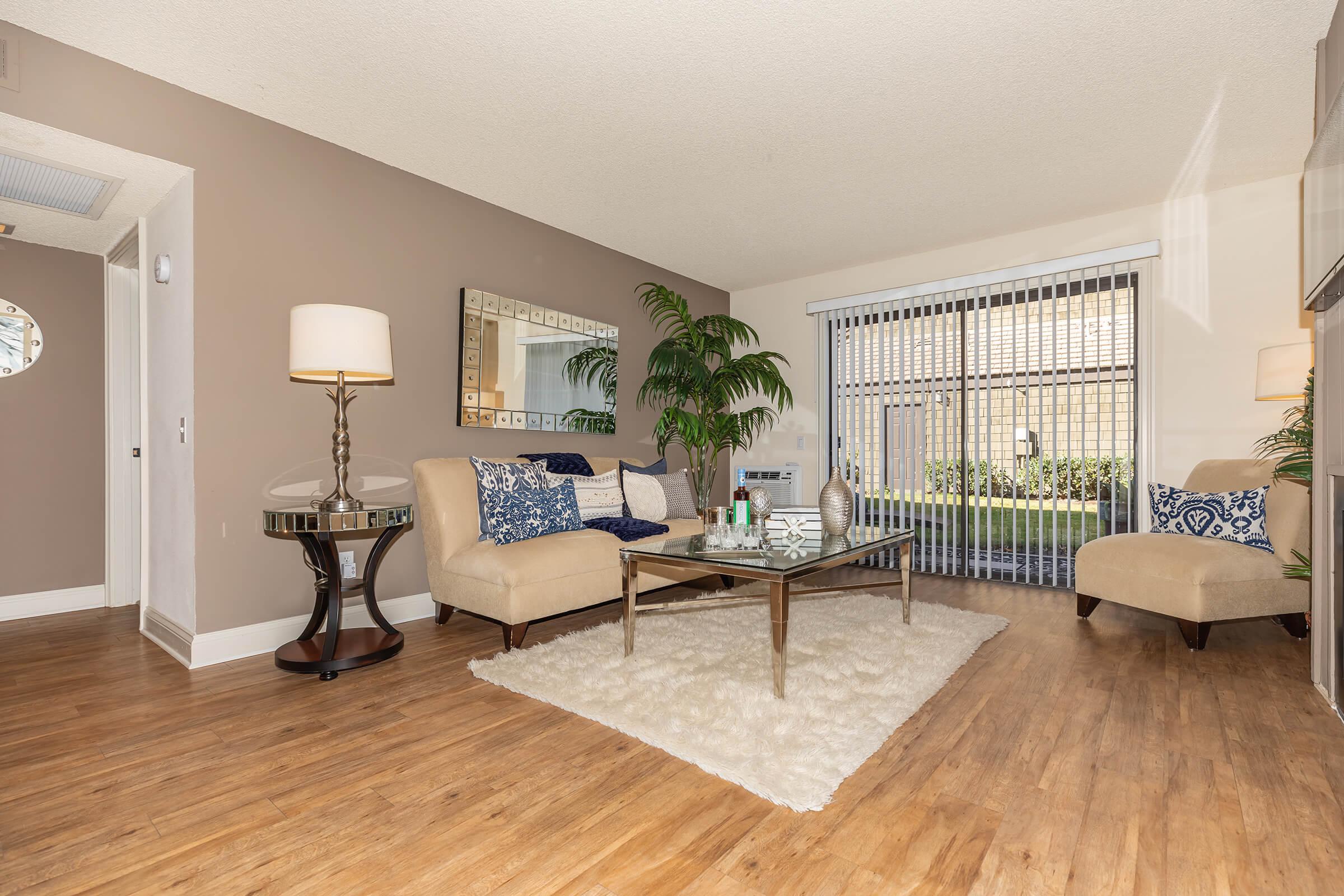 Living room with tan furniture