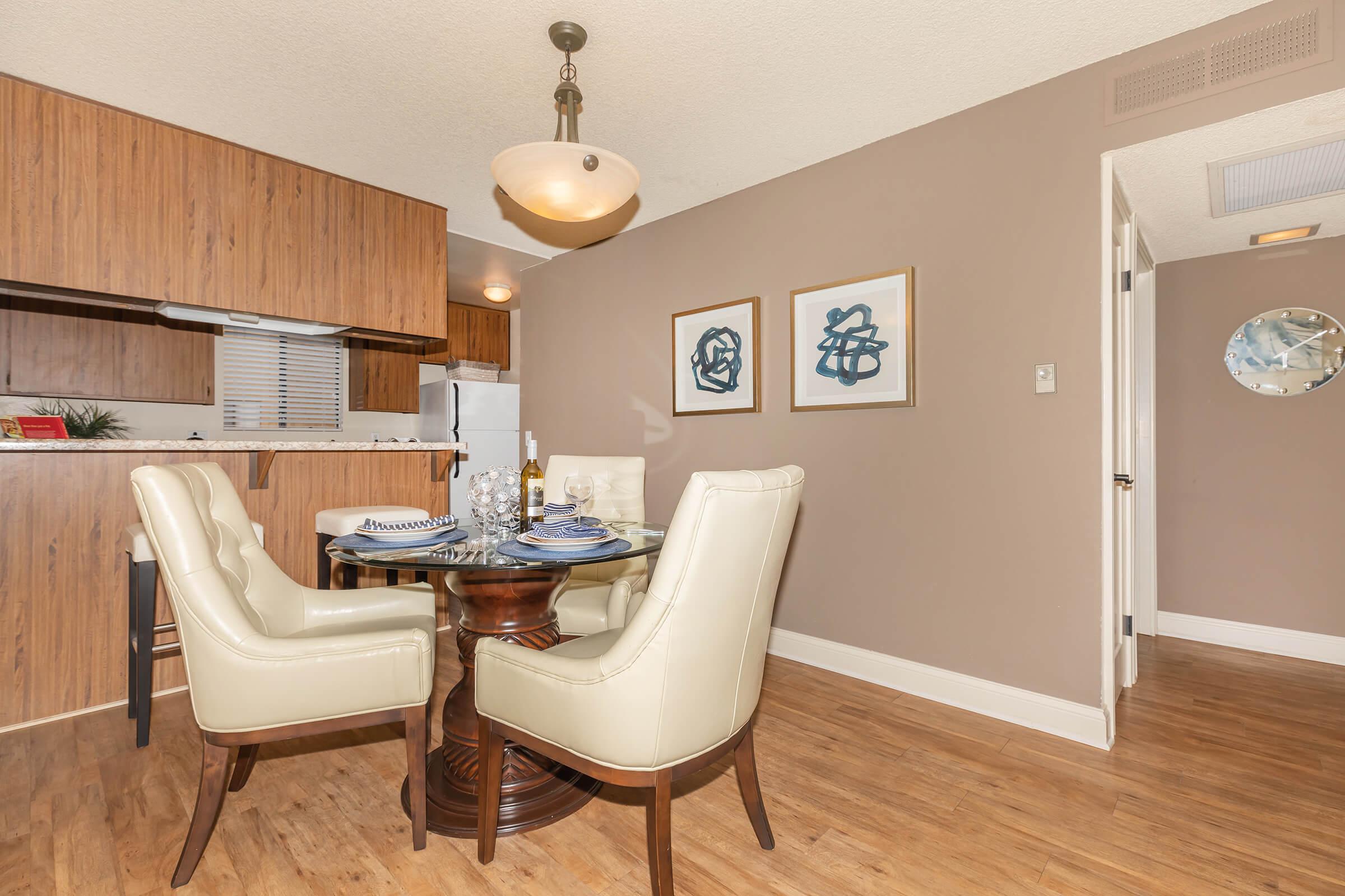 Dining room with white chairs