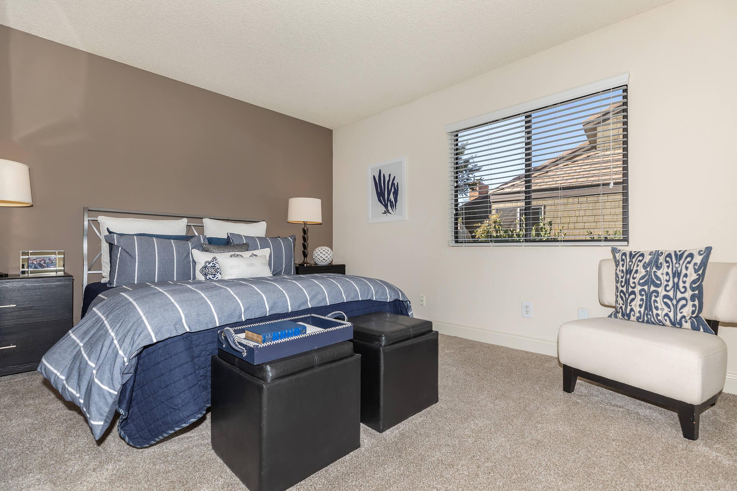 Bedroom with blue bedding