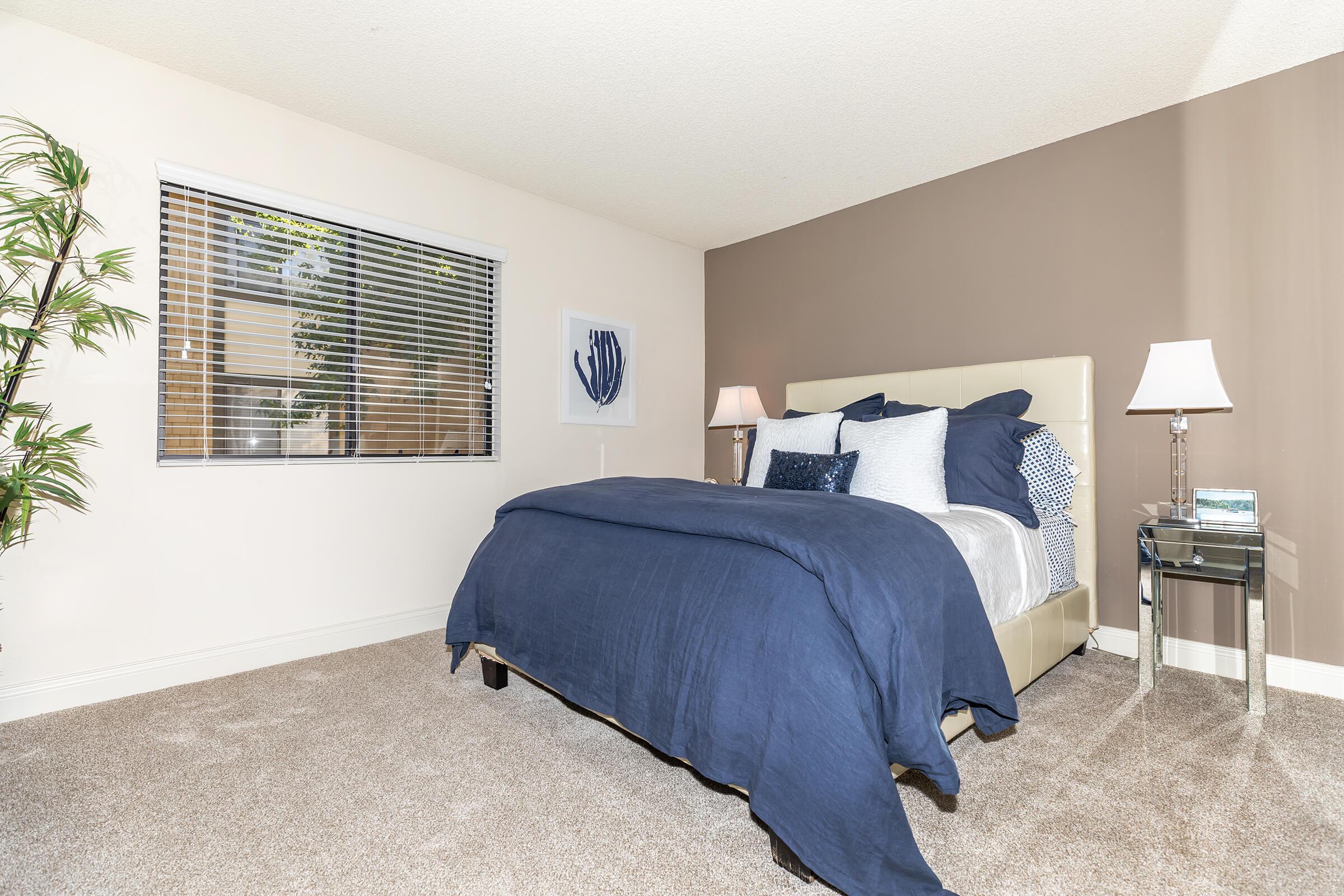 Bedroom with a green plant