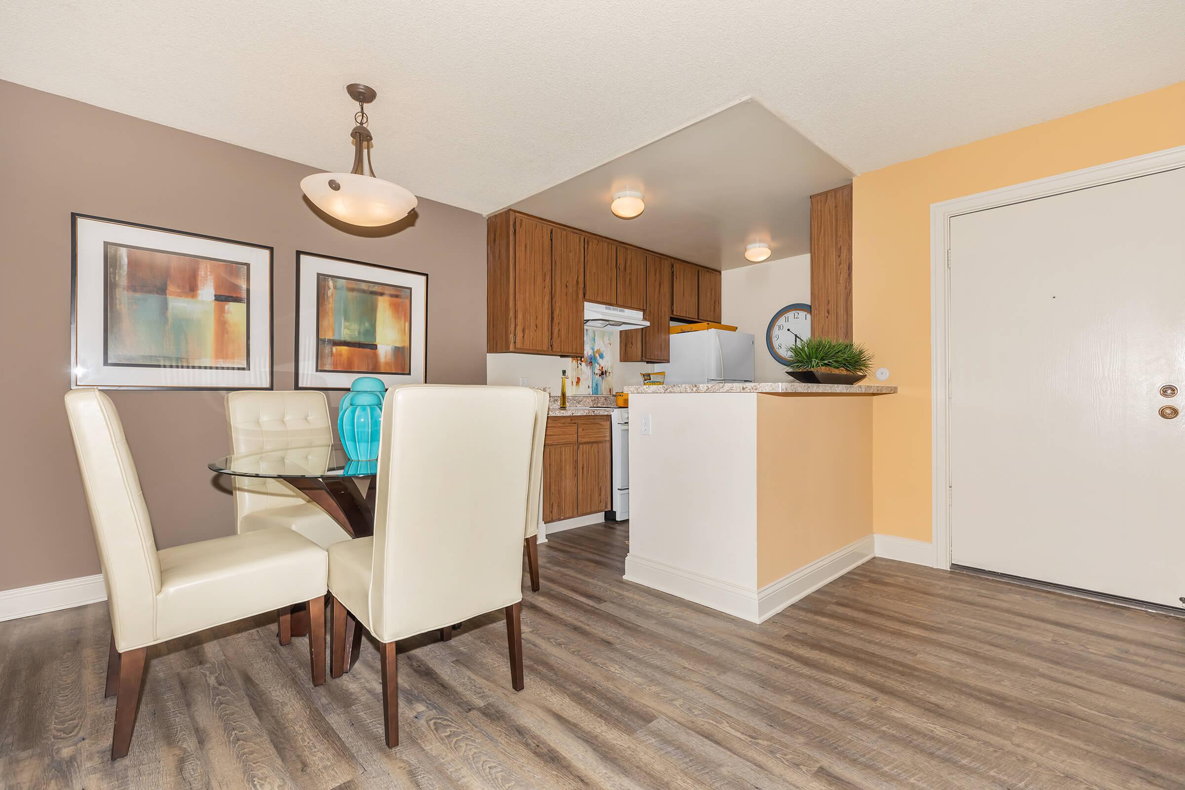 Entrance and dining room with wooden floors