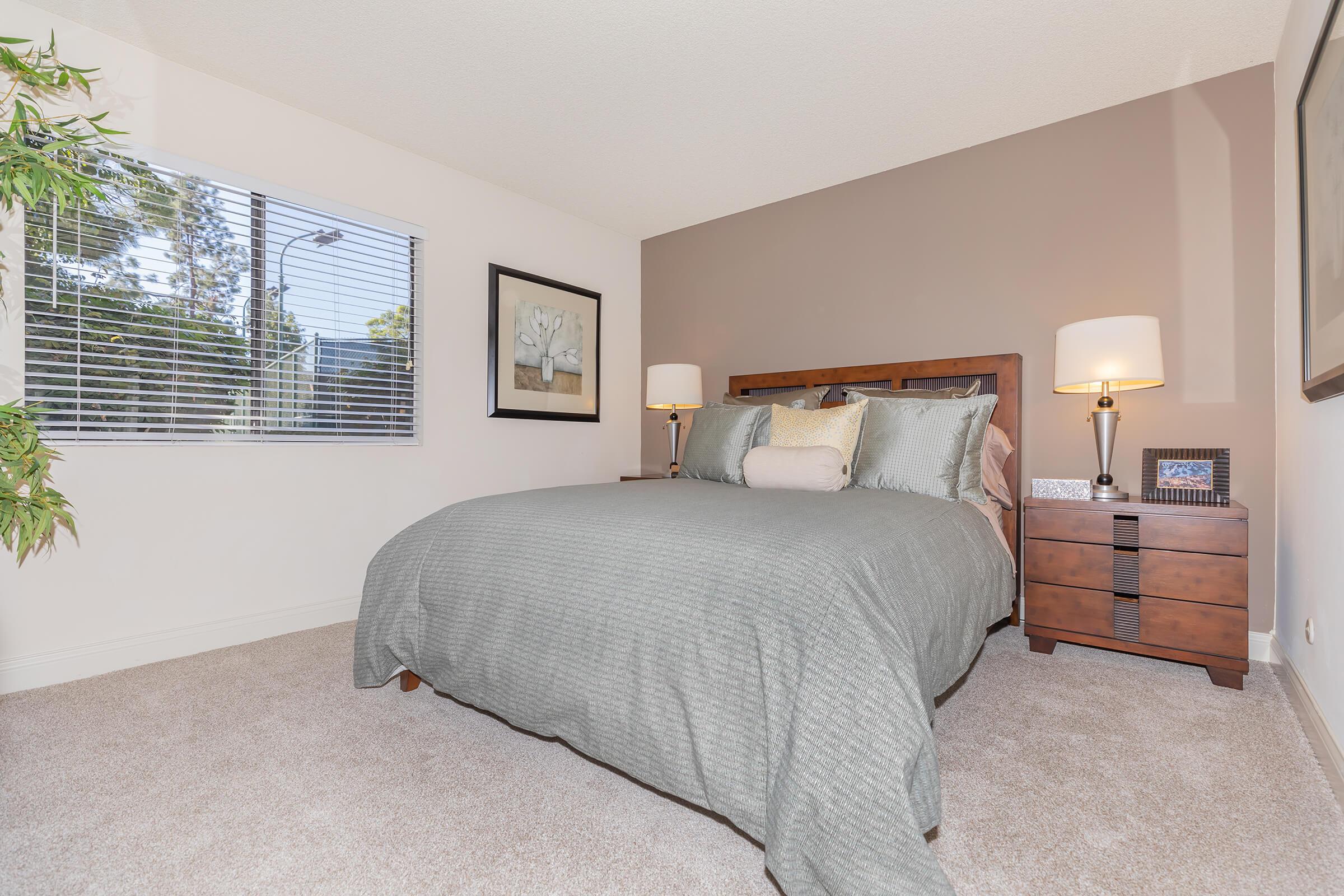 Bedroom with wooden night stands