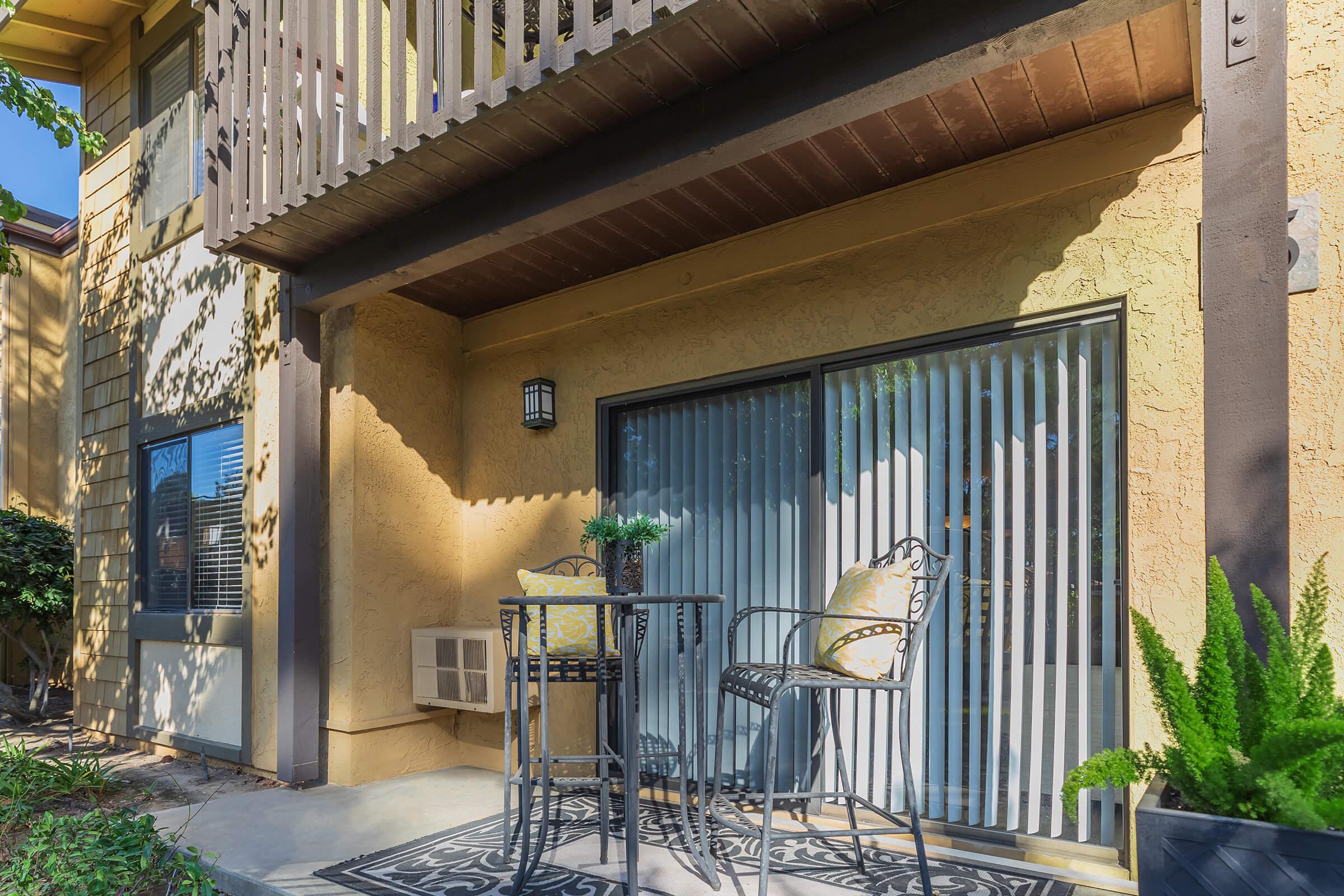 Patio with a table and chairs