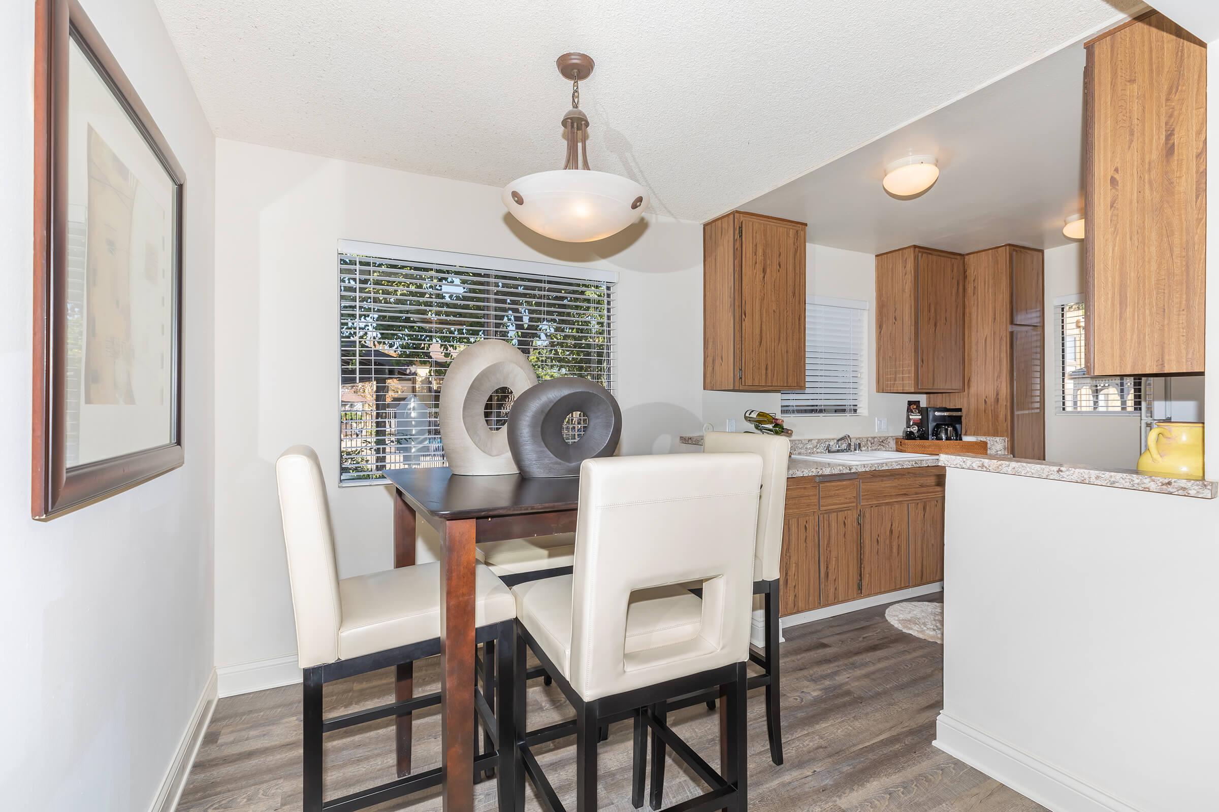 Kitchen and dining room with wooden floors