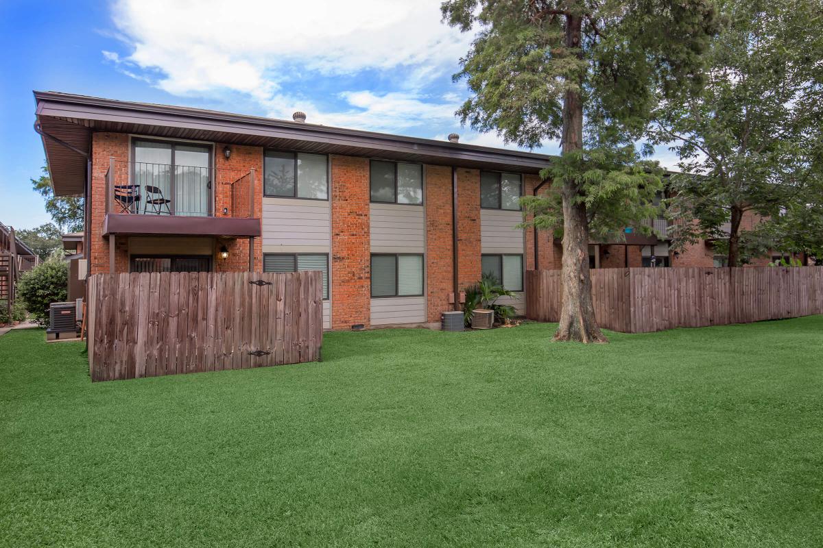 a large lawn in front of a house