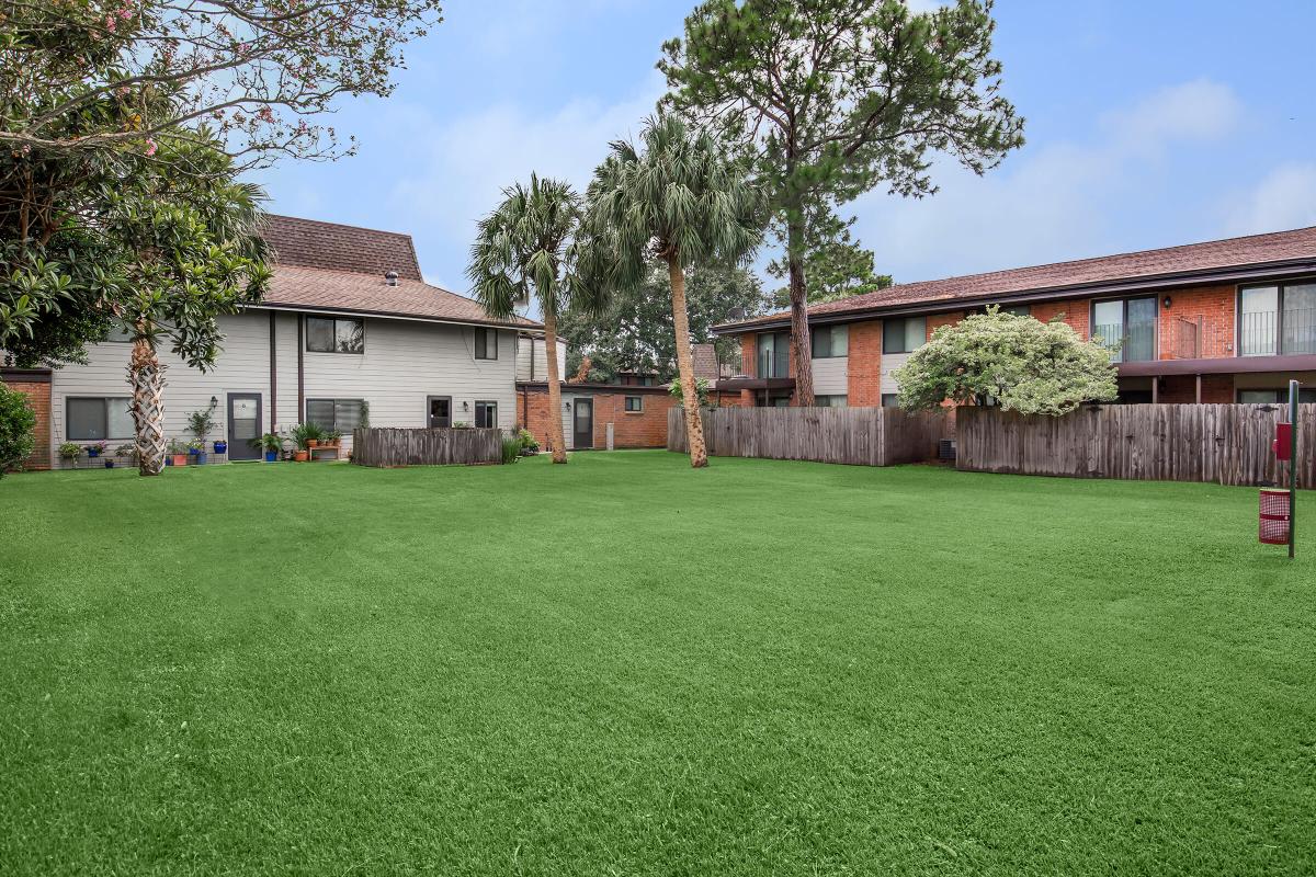 a large lawn in front of a house