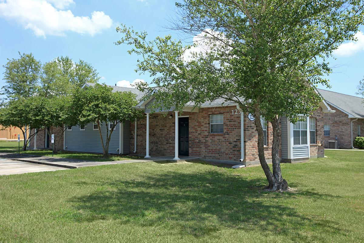 a large lawn in front of a house