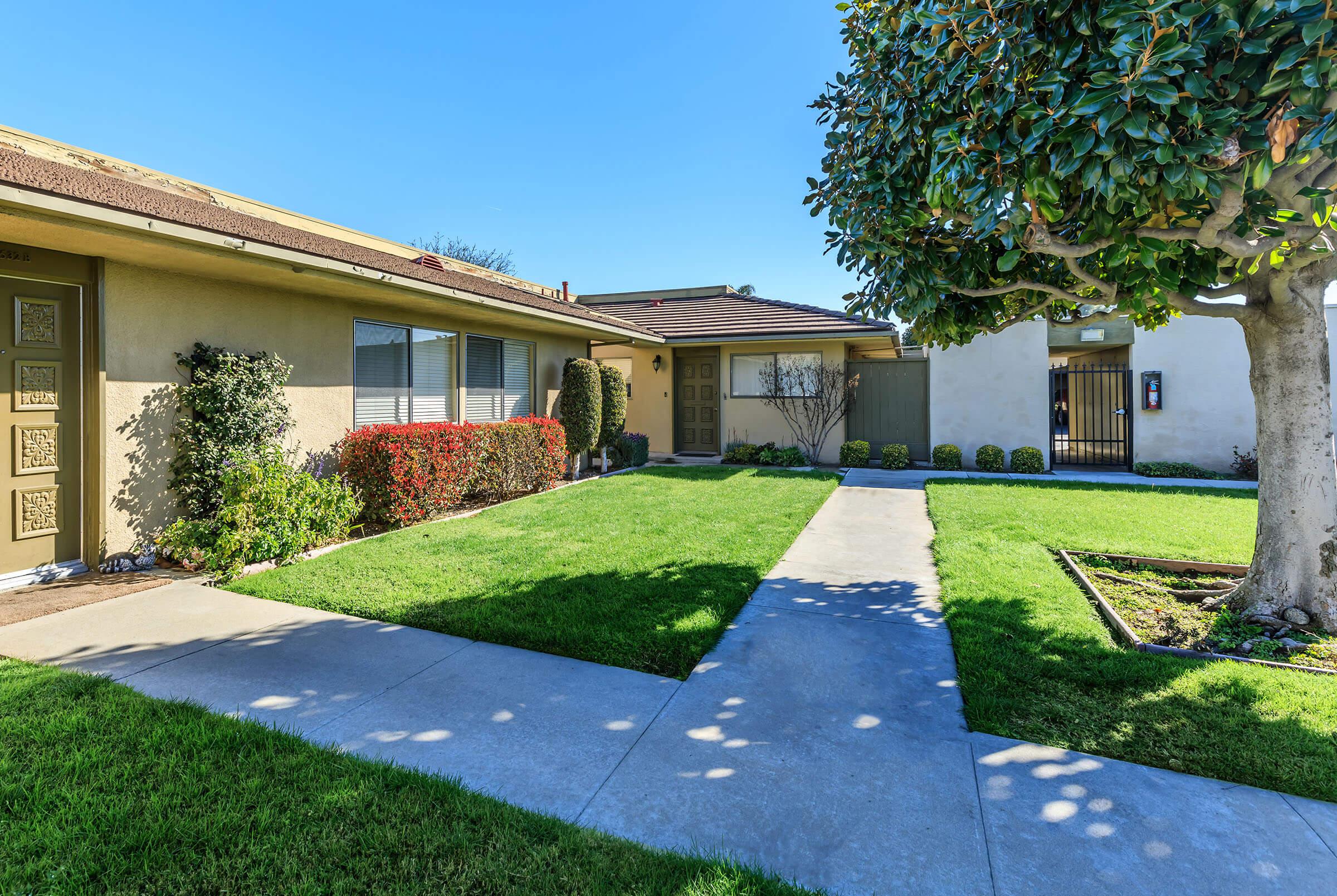 a large lawn in front of a house