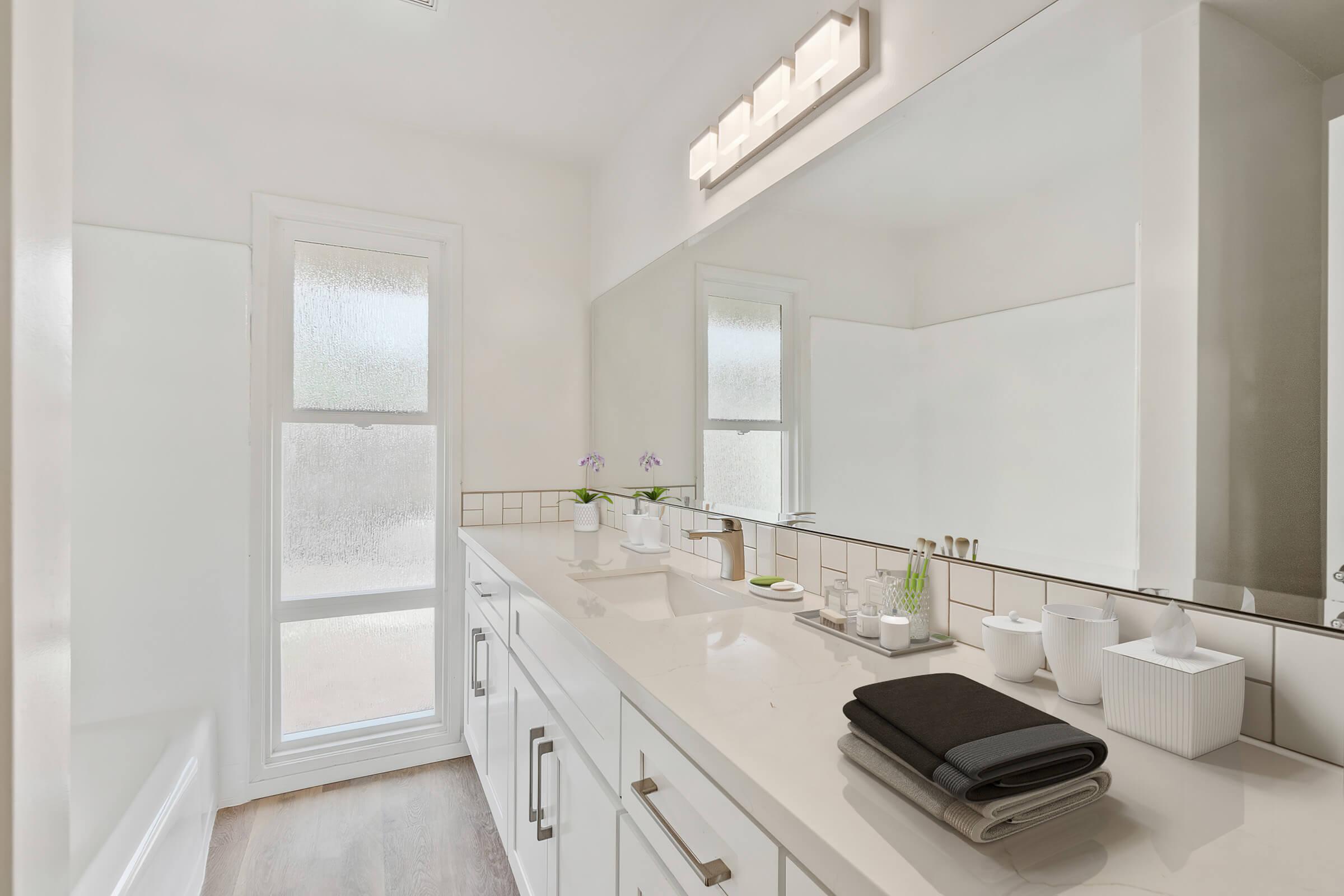 a kitchen with a sink and a window