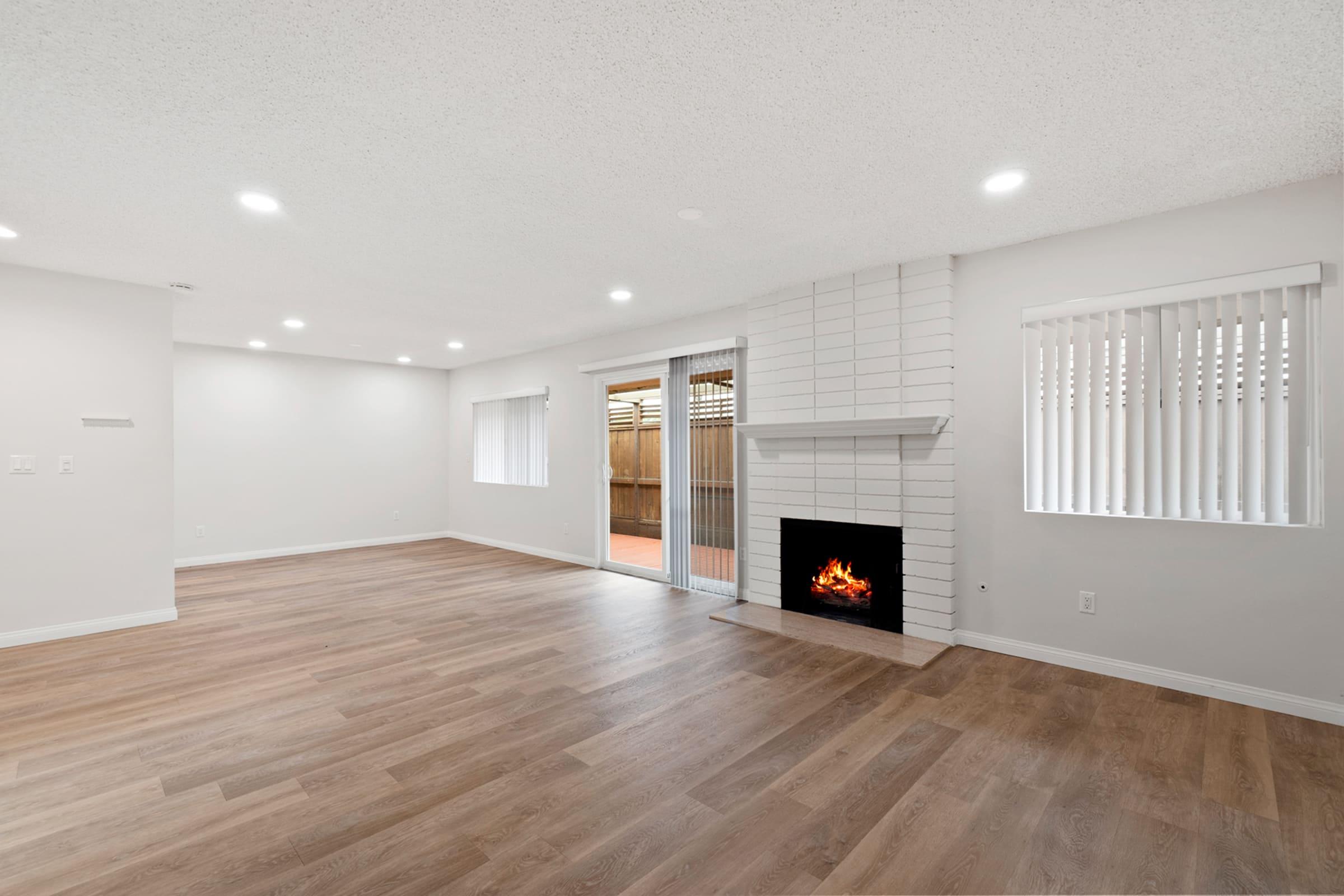 a living room with a wood floor