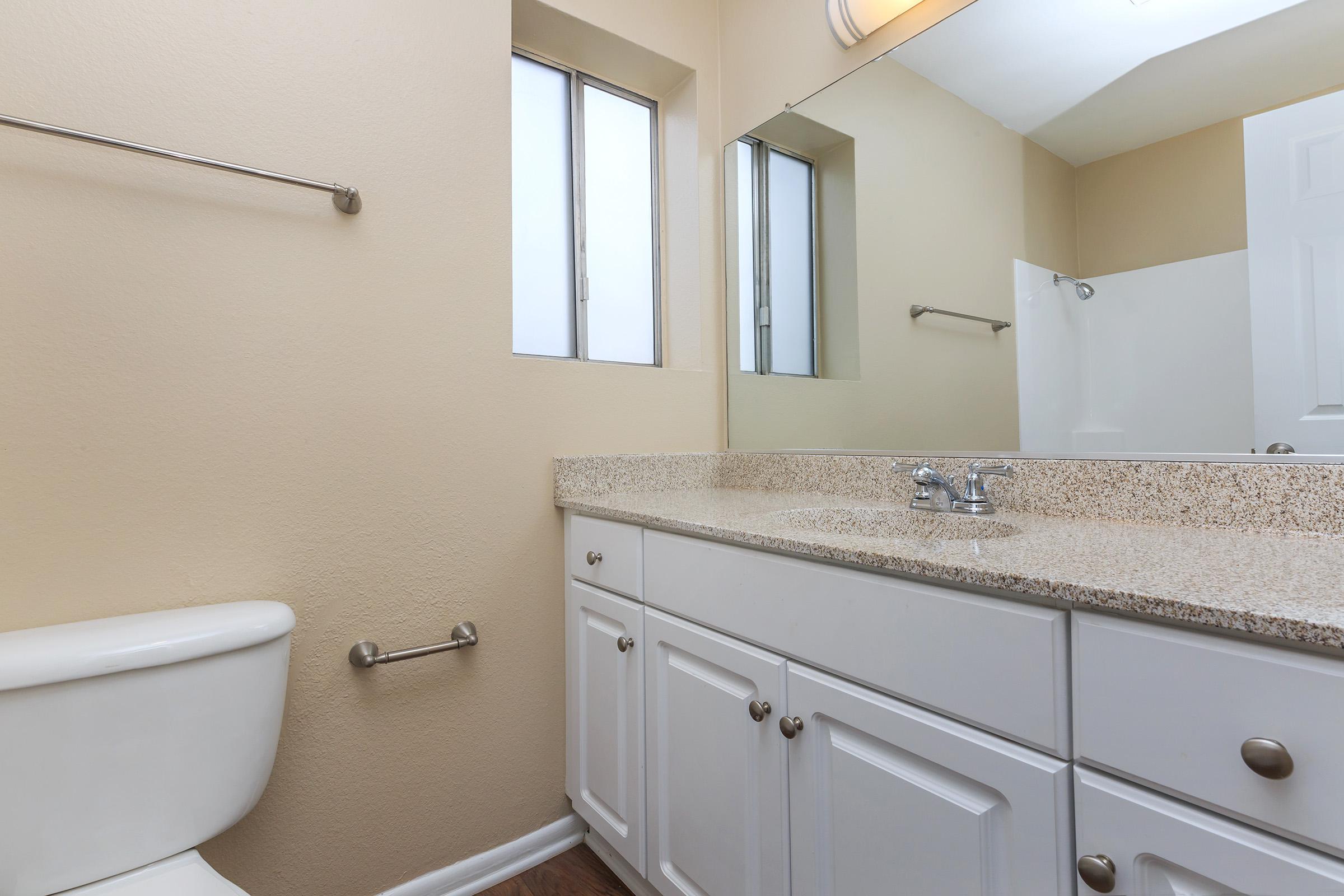 Unfurnished bathroom with wooden floors