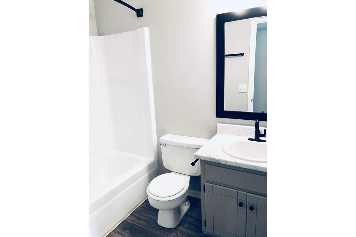 There are bright and cozy bathrooms in every home.