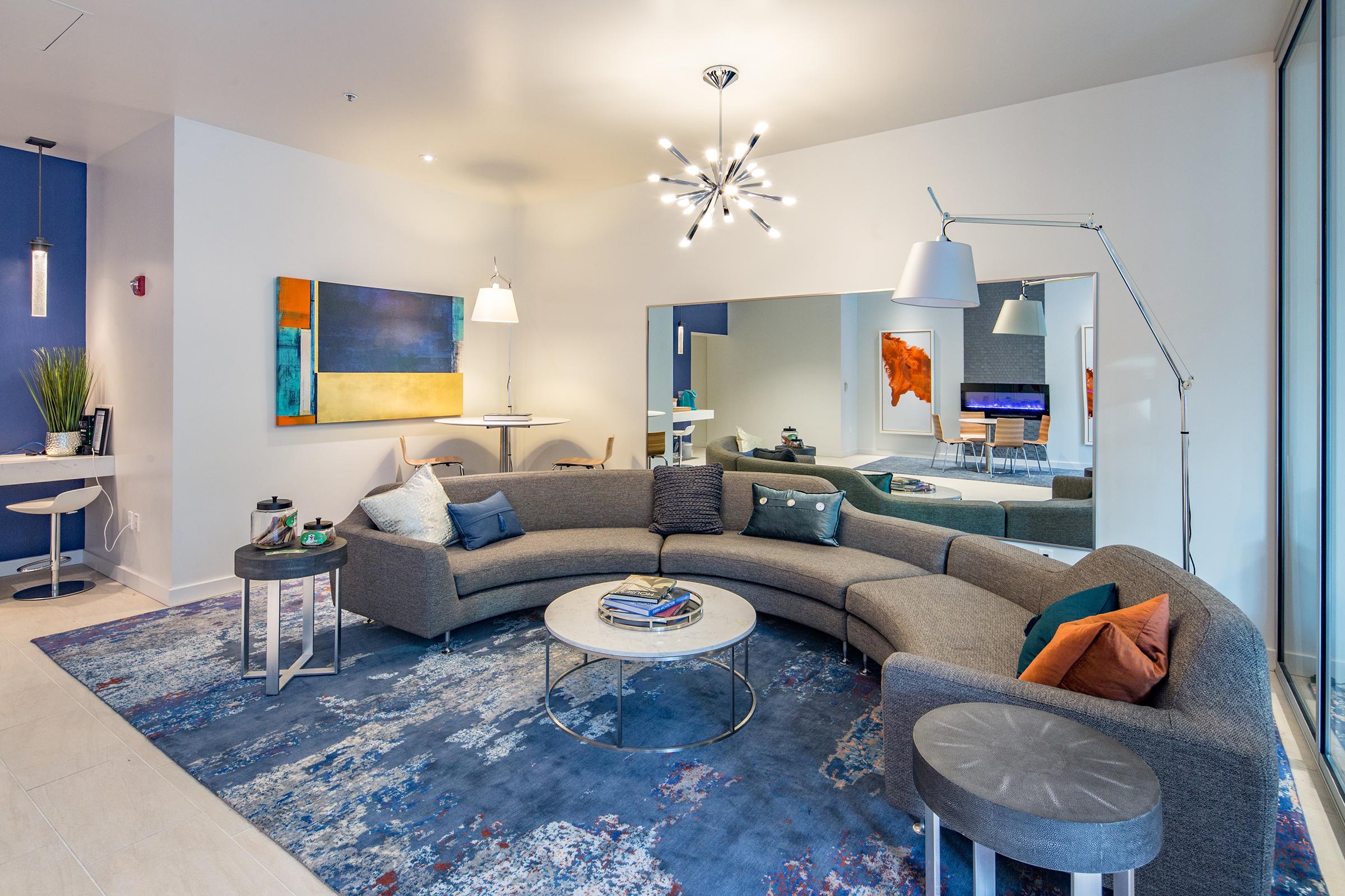 large couch with a coffee table in the community lounge.