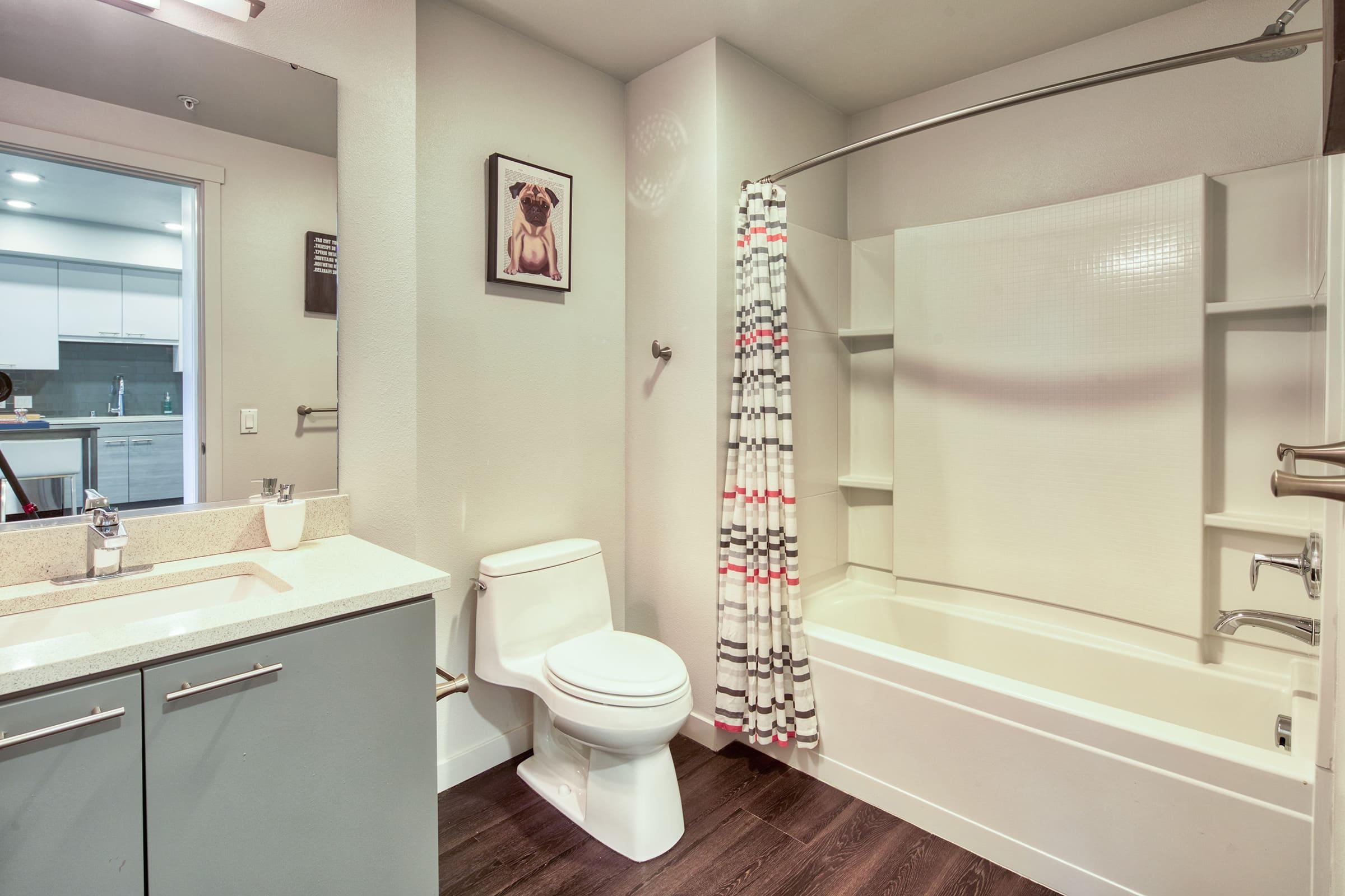 bathroom with tub and shower.