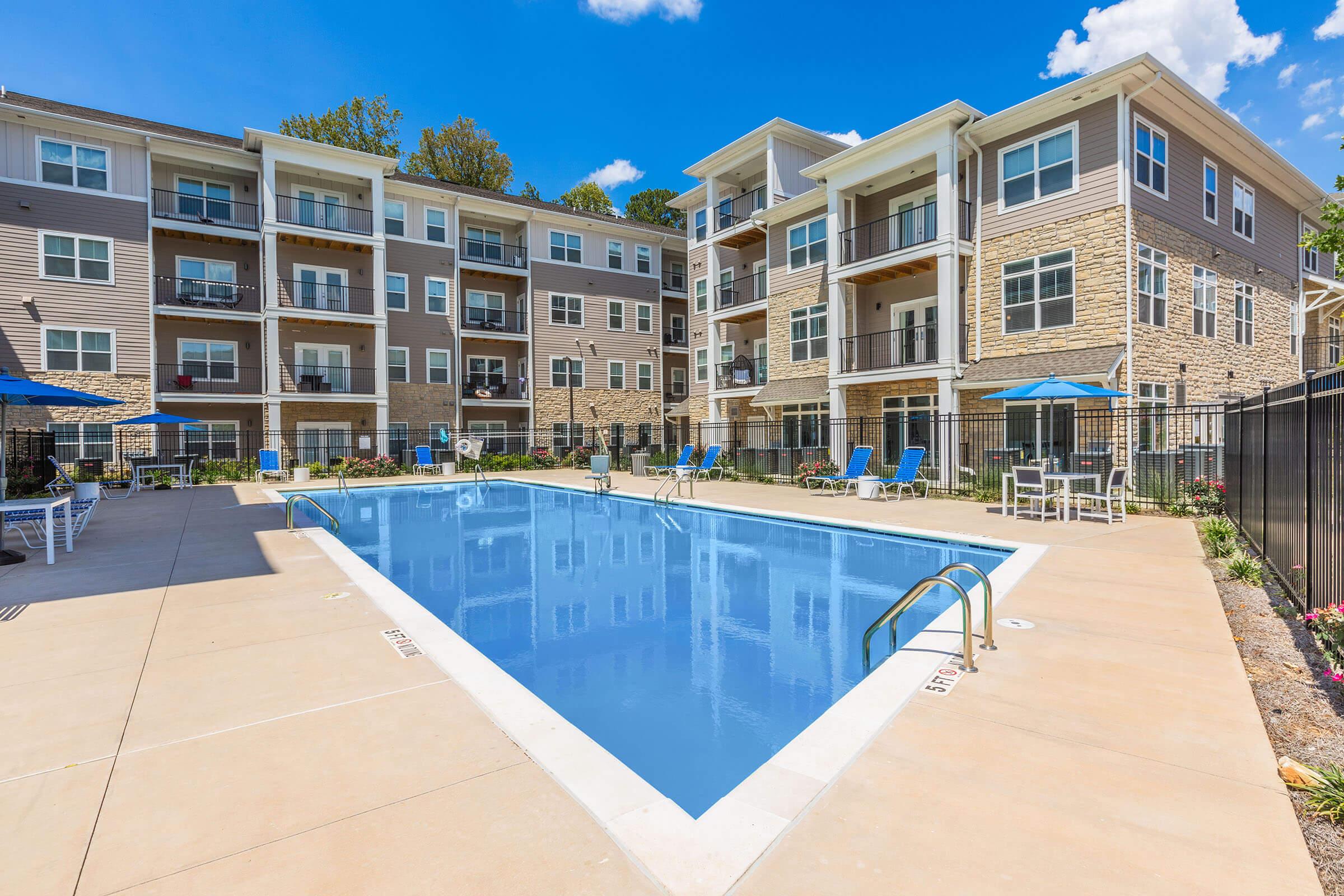 a pool in front of a building