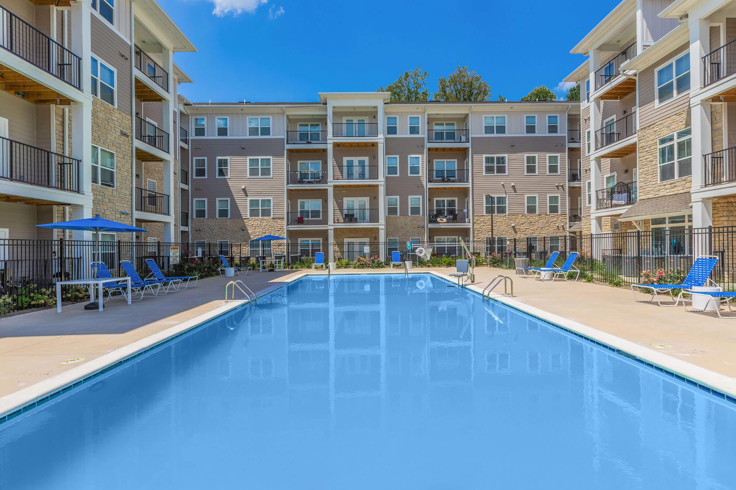 a pool next to a building