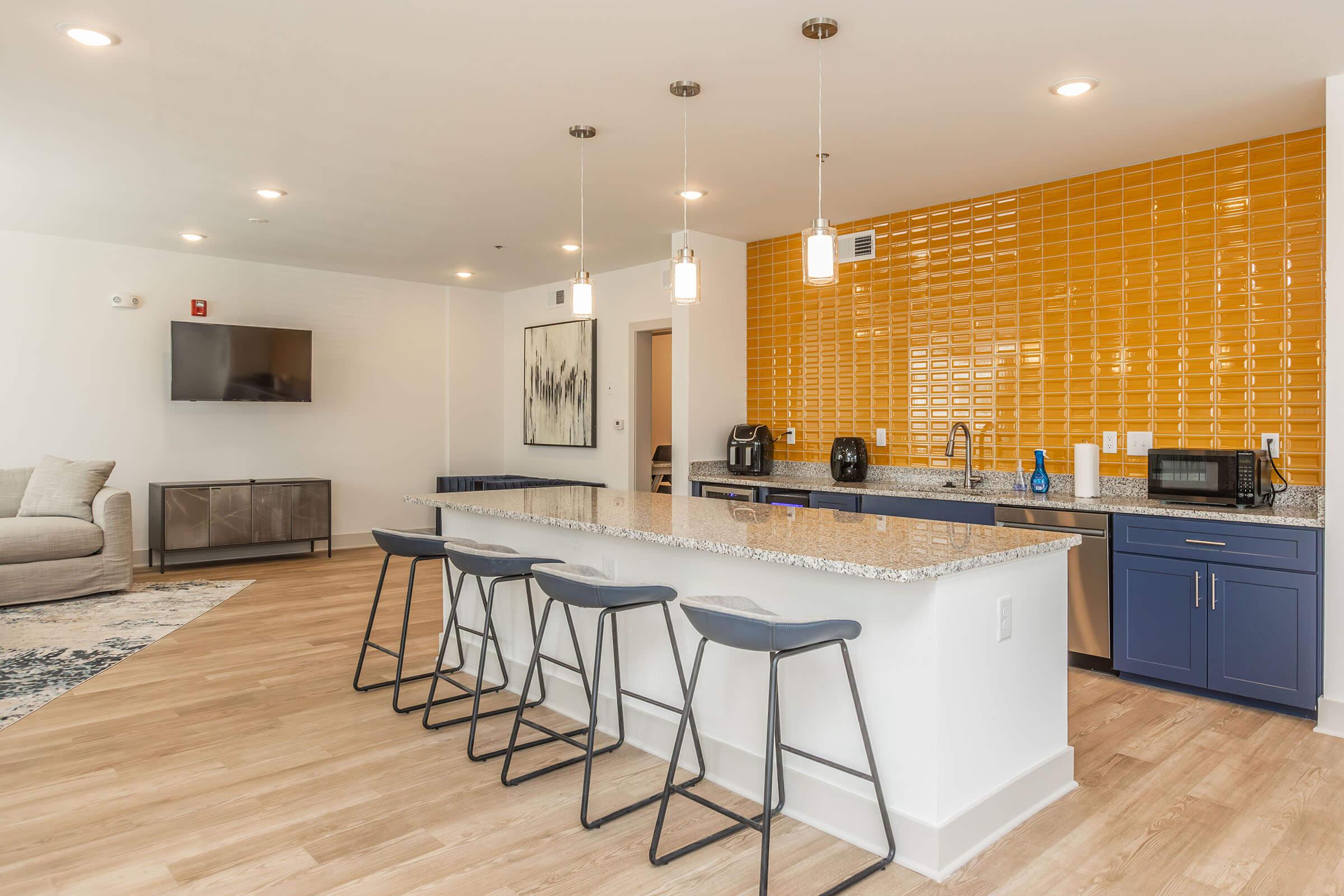 a kitchen with a table in a room