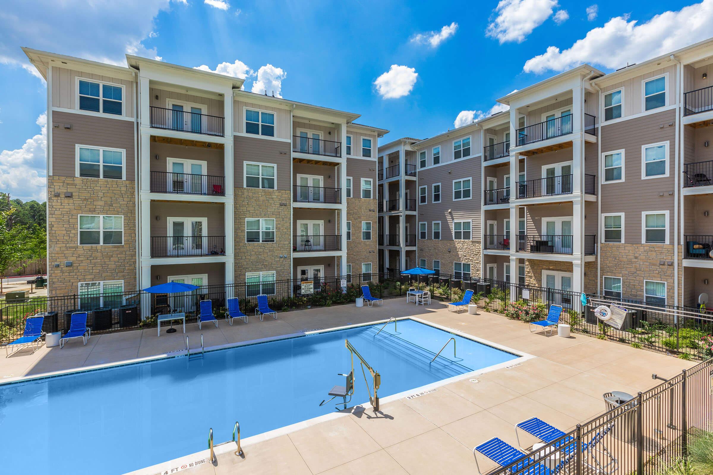 a pool next to a building