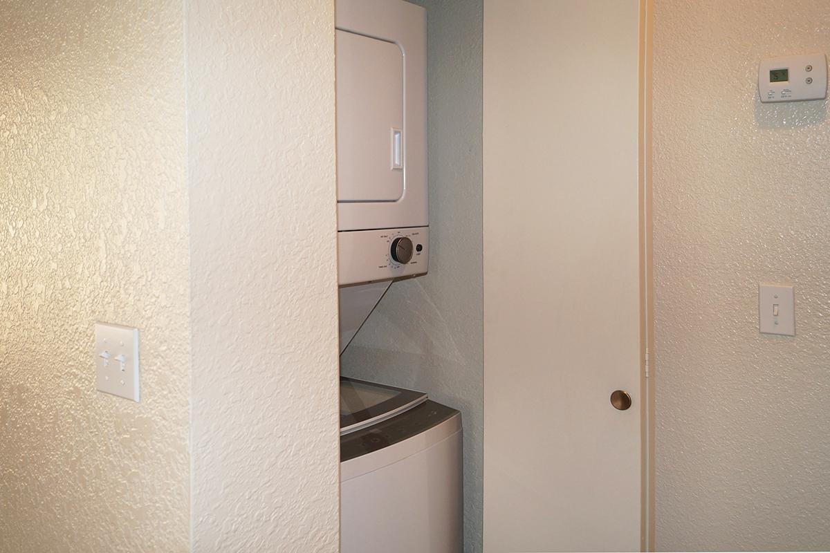 a white sink sitting next to a door