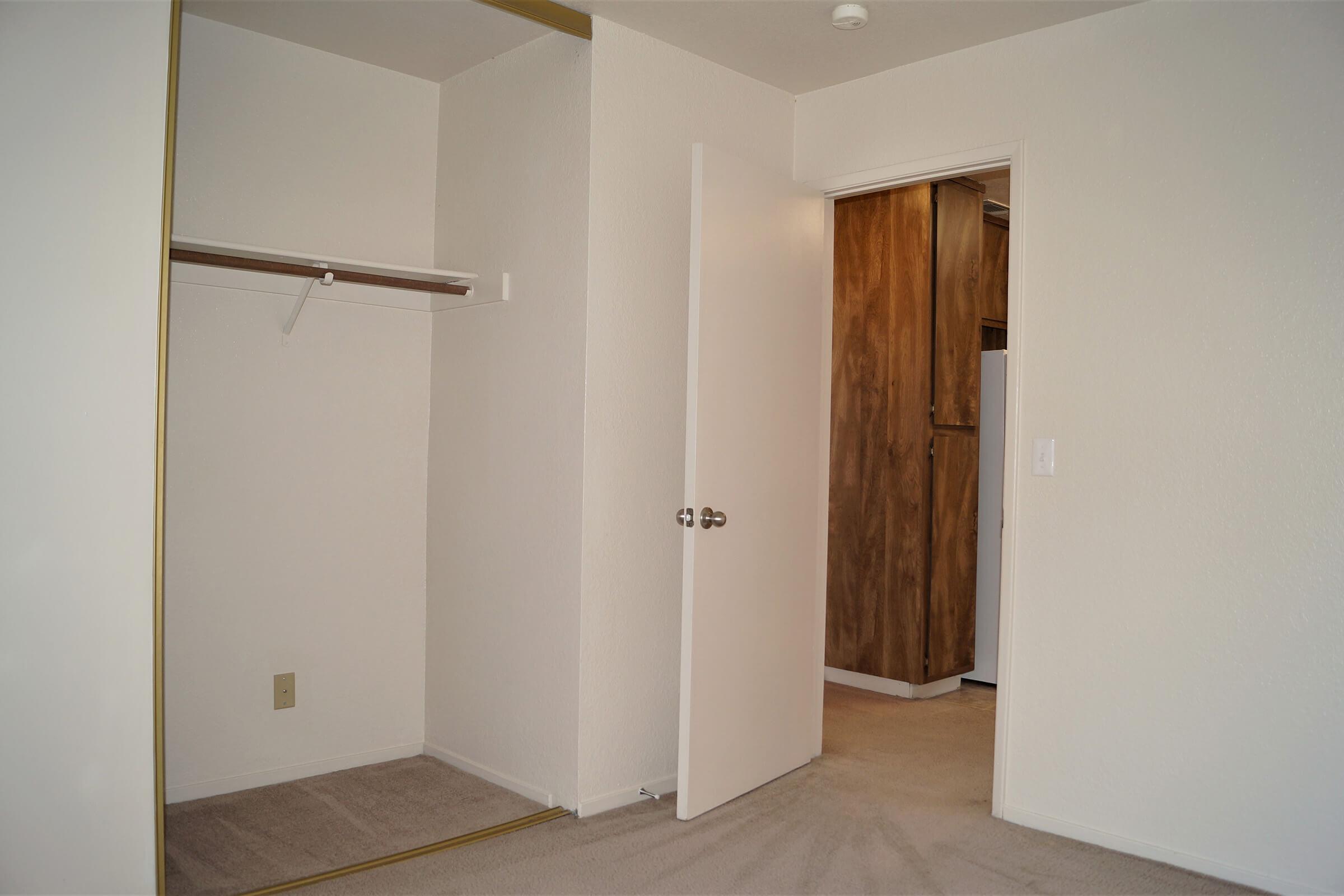 a white refrigerator freezer sitting in a room