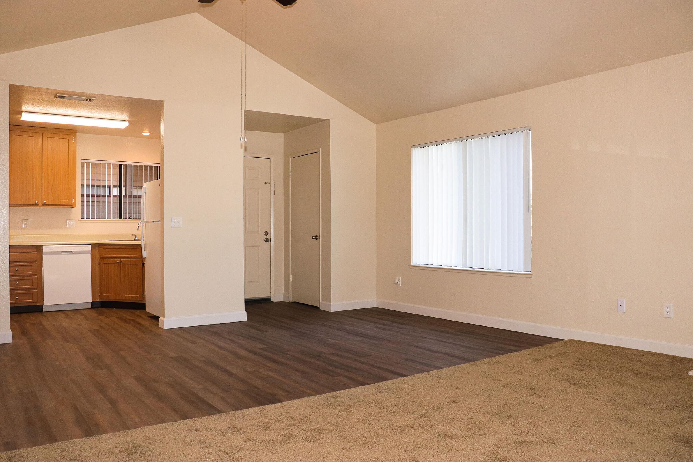 a kitchen with a wood floor