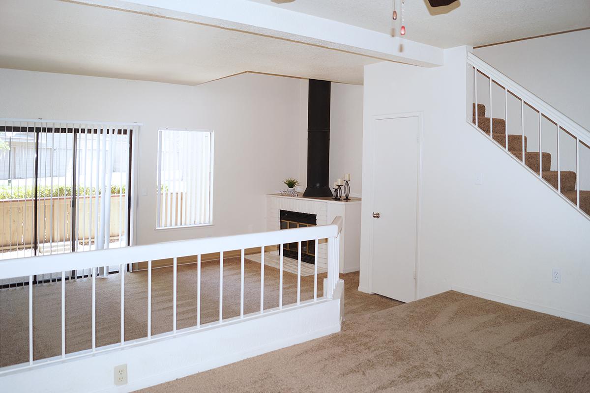 a bedroom with a large window