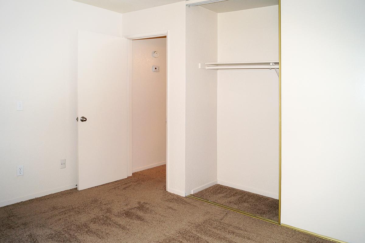 a white refrigerator freezer sitting inside of a building