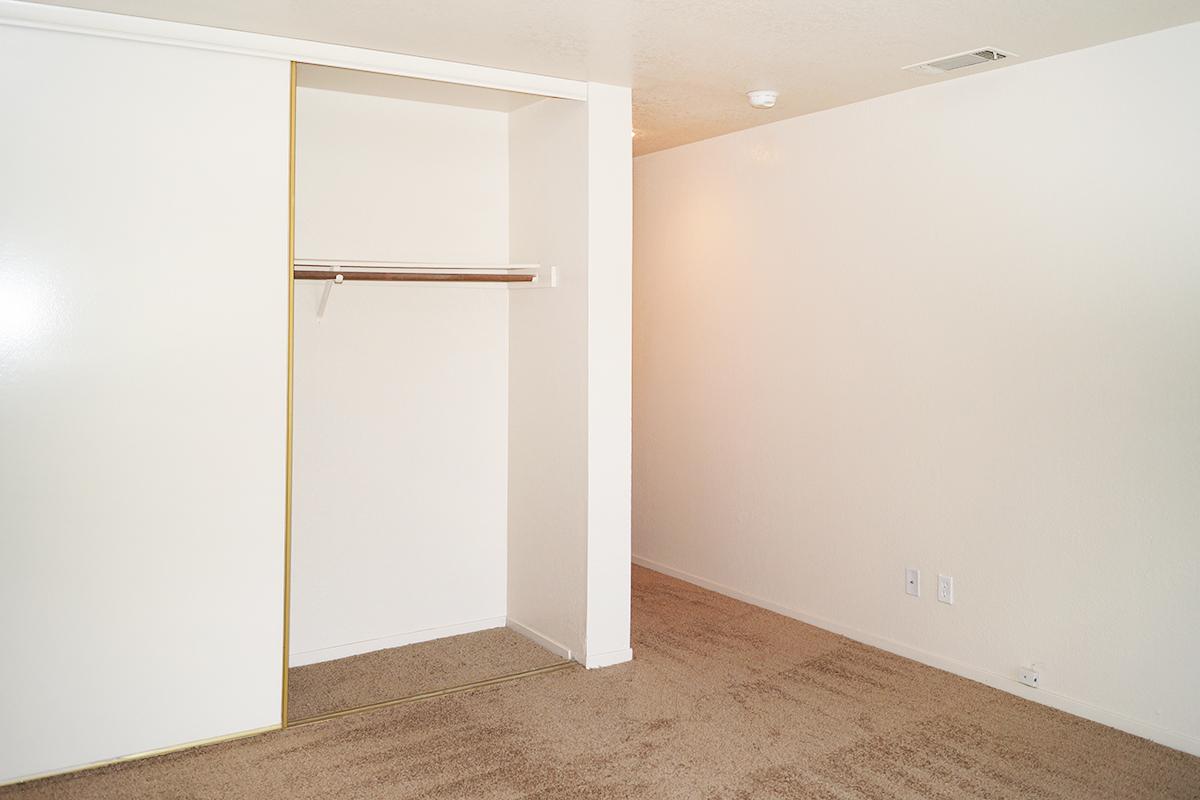 a white refrigerator freezer sitting in a room