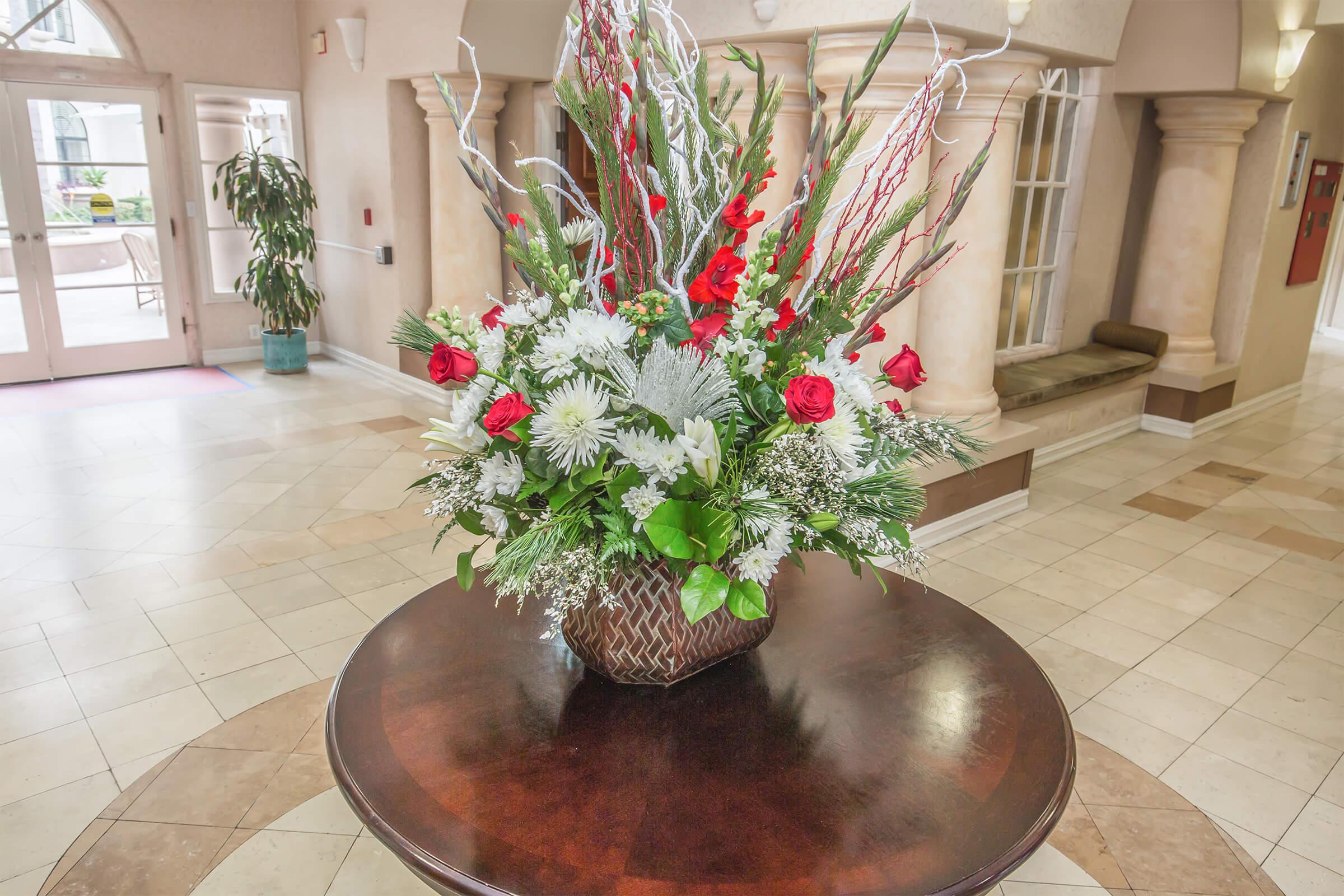 a vase of flowers on a table