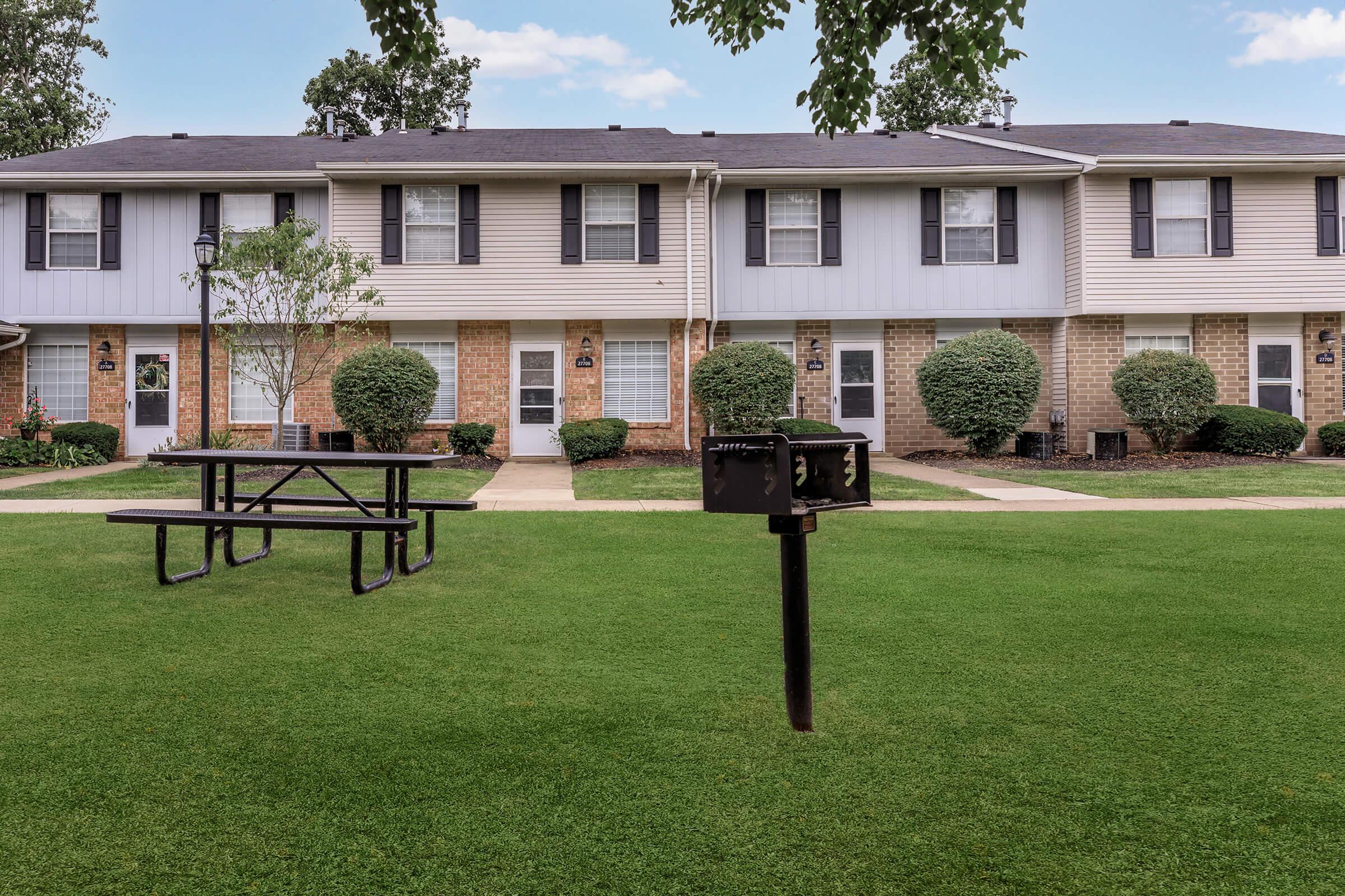 a large lawn in front of a house