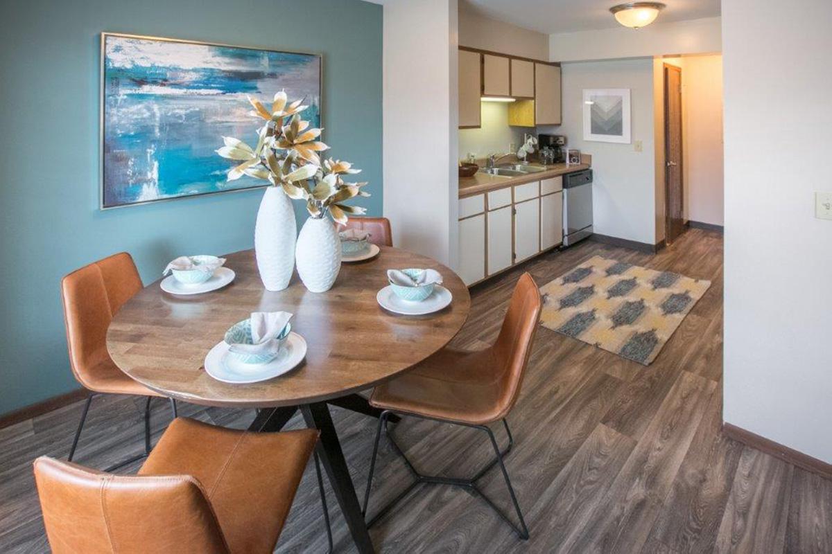 a room filled with furniture and a table