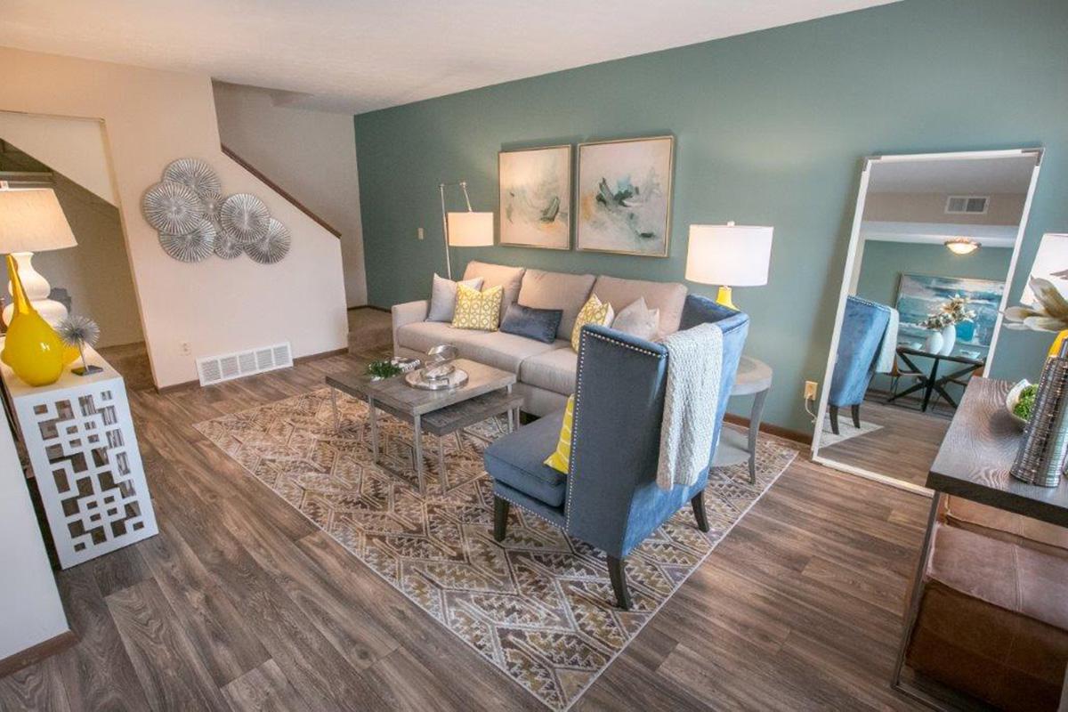 a living room with a wooden floor