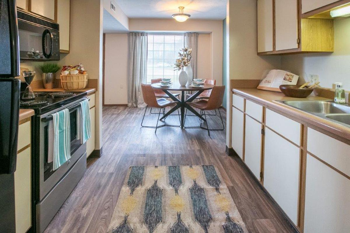a room filled with furniture and a stove