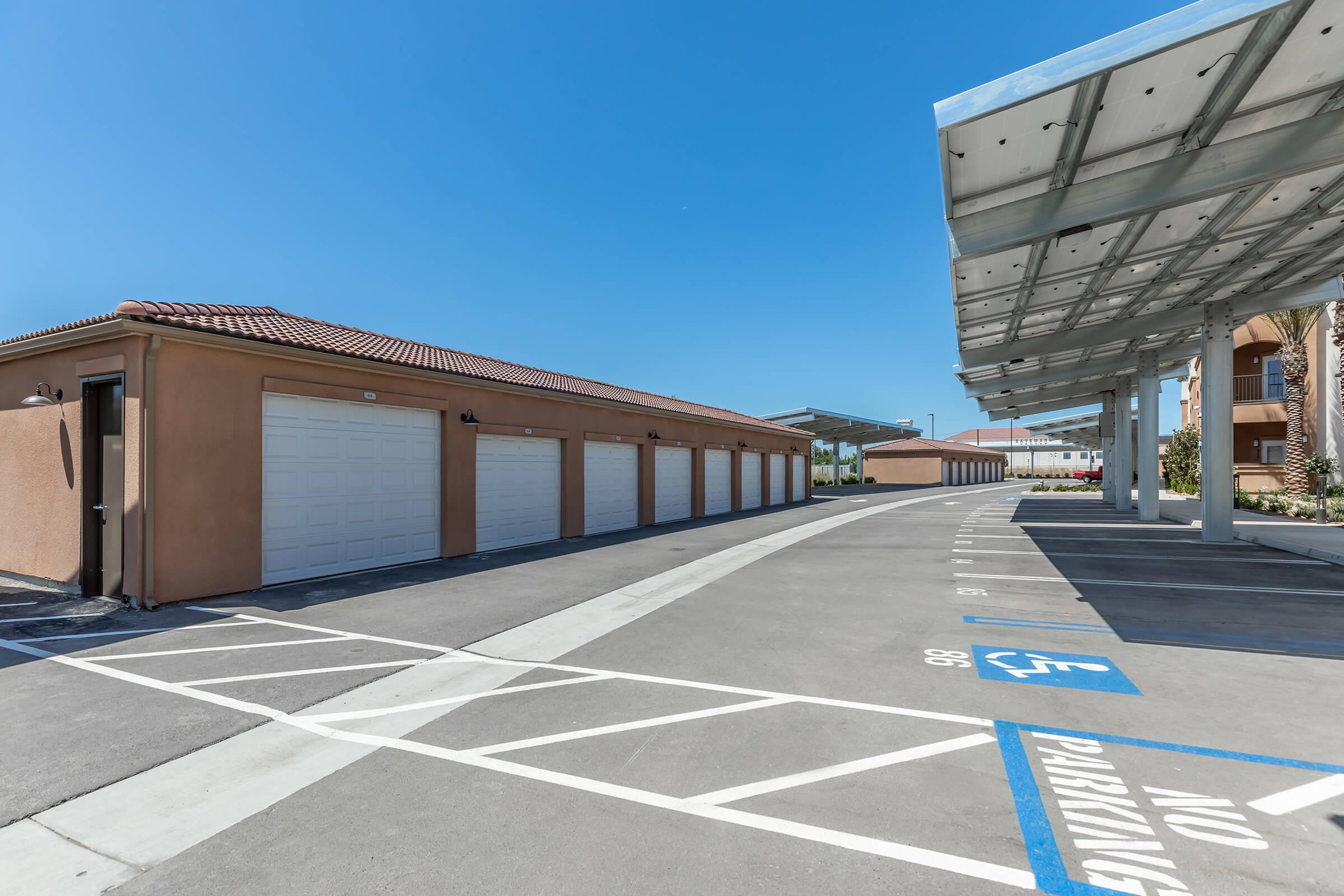 an empty parking lot in front of a building