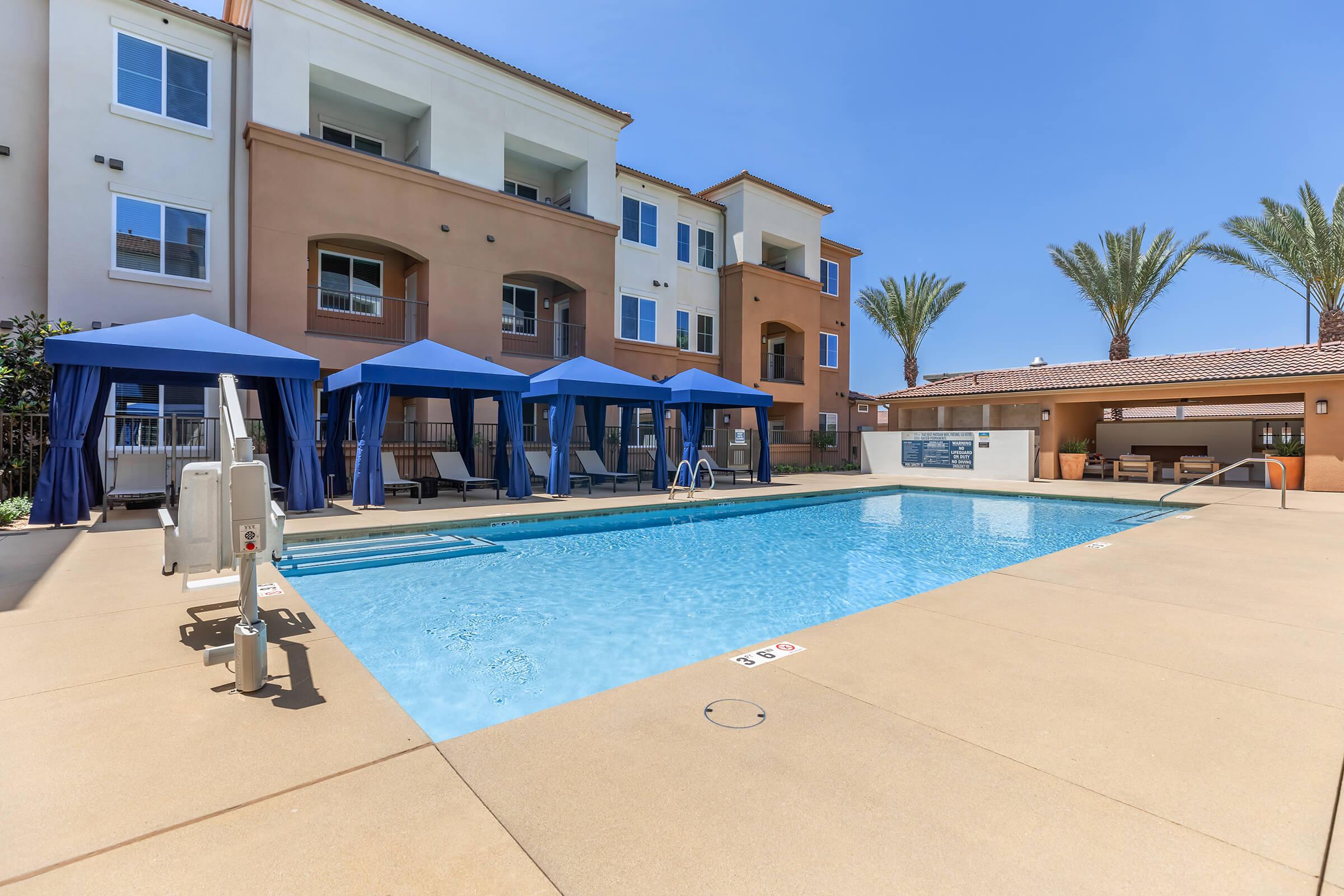 a pool next to a building