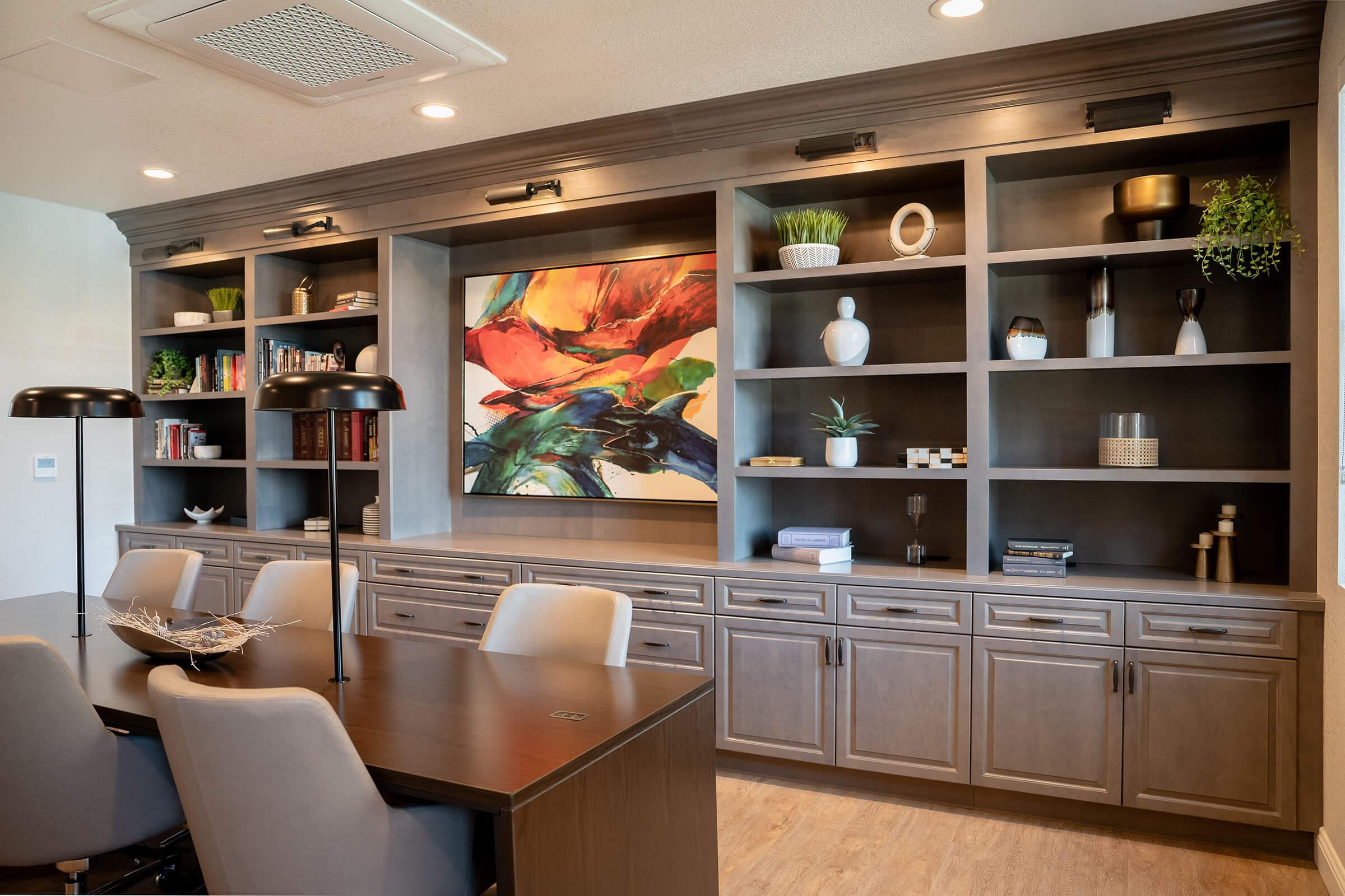 a living room filled with furniture and a large window