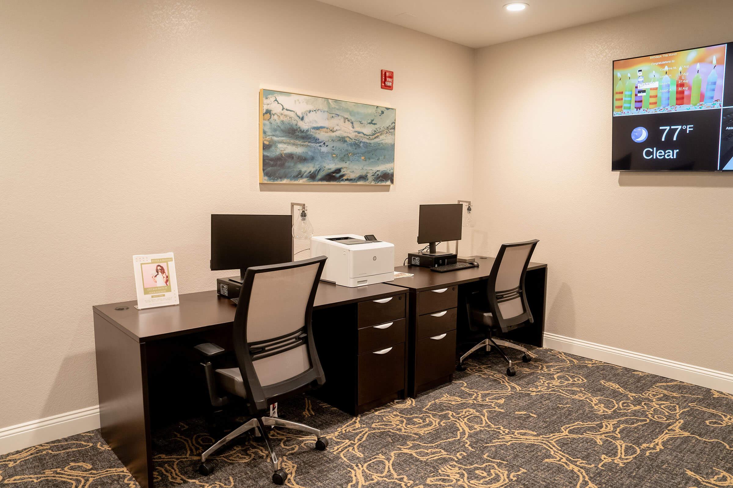 a bedroom with a large screen television