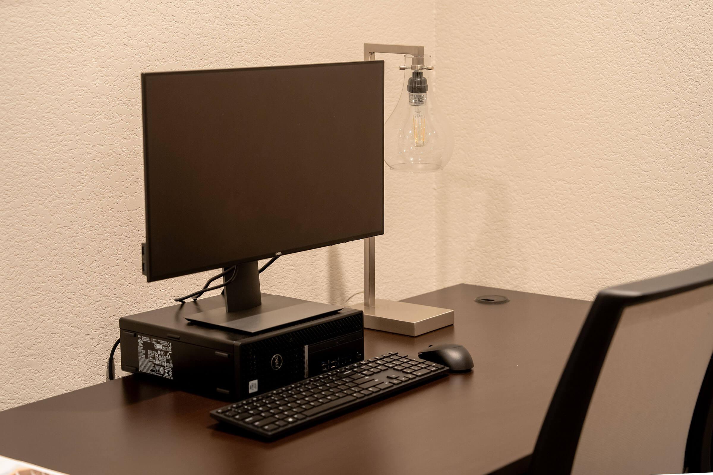 a desktop computer sitting on top of a desk