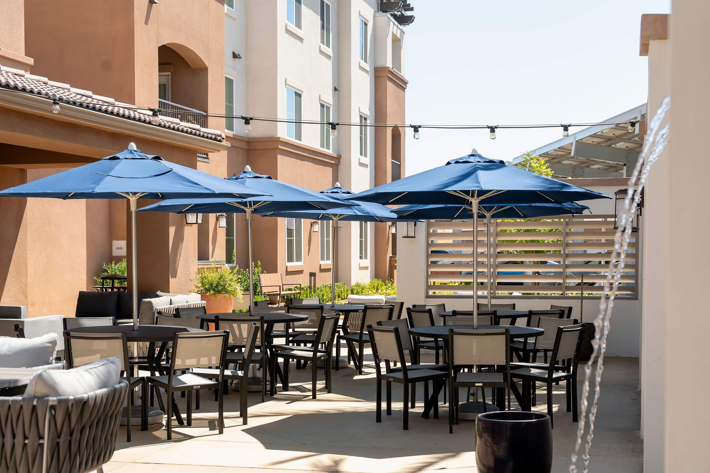 a dining room table in front of a building