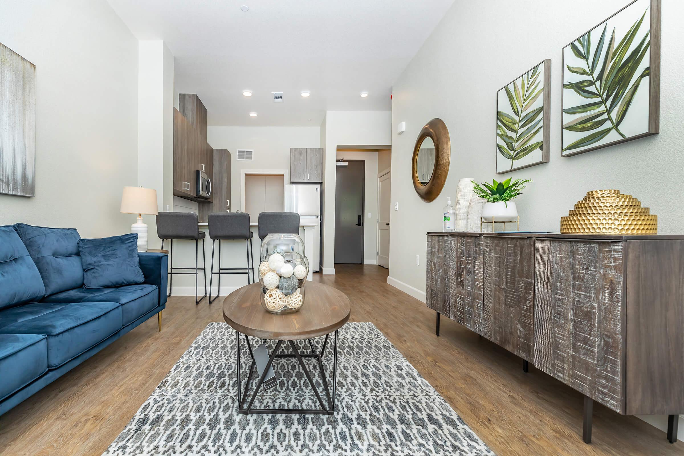 a living room with a wooden floor