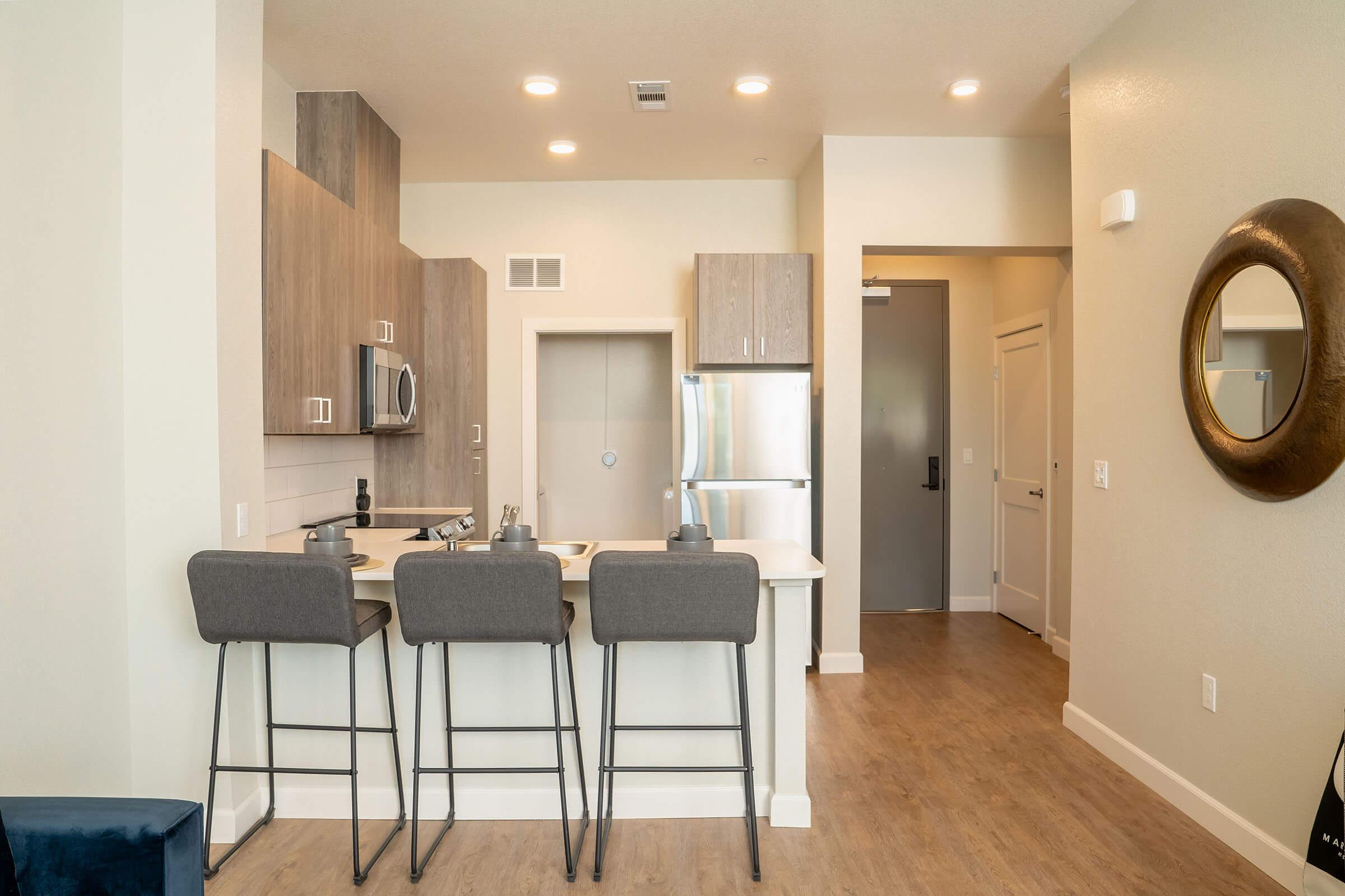 a room filled with furniture and a sink