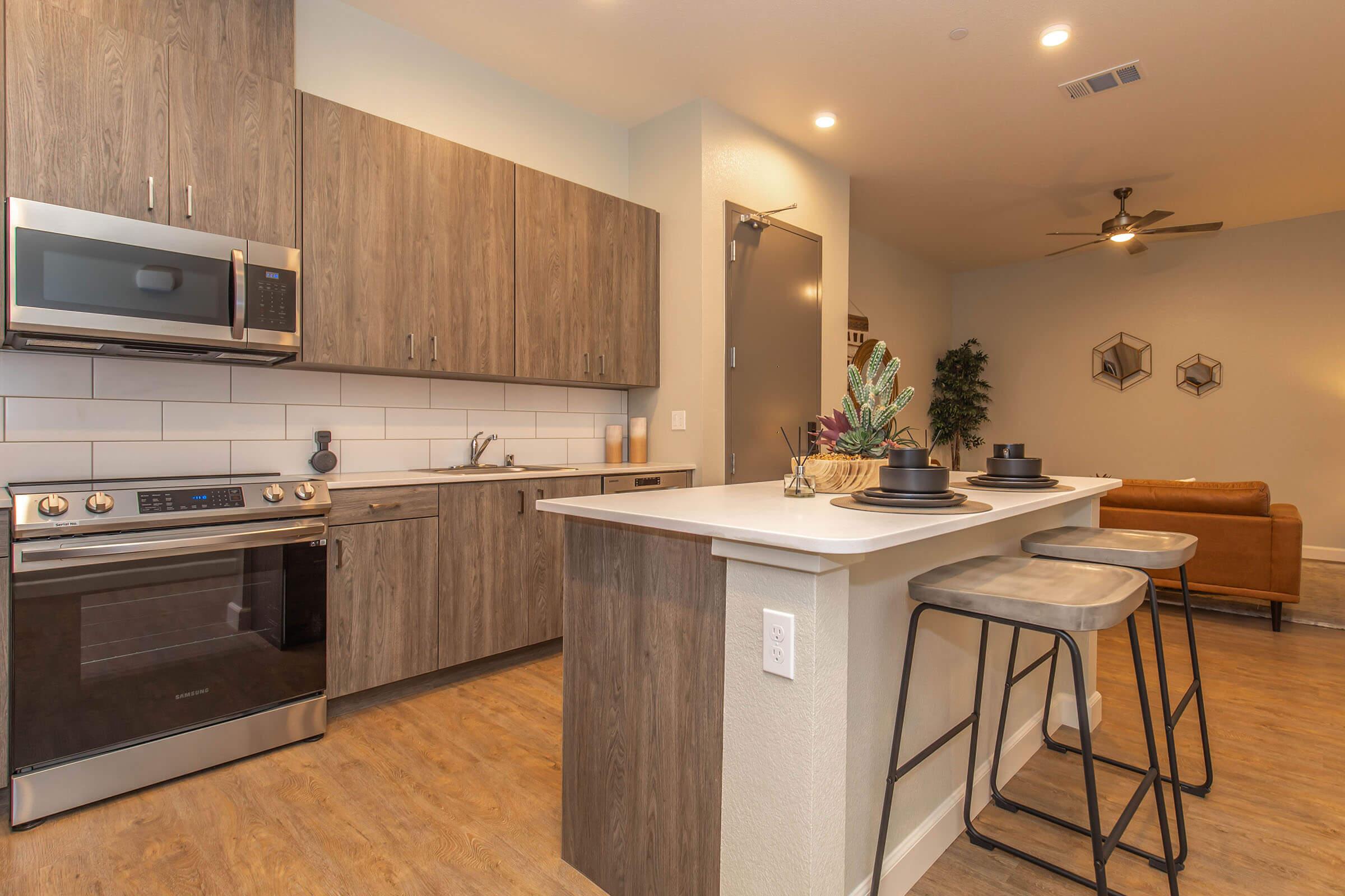 a kitchen with a stove and a sink