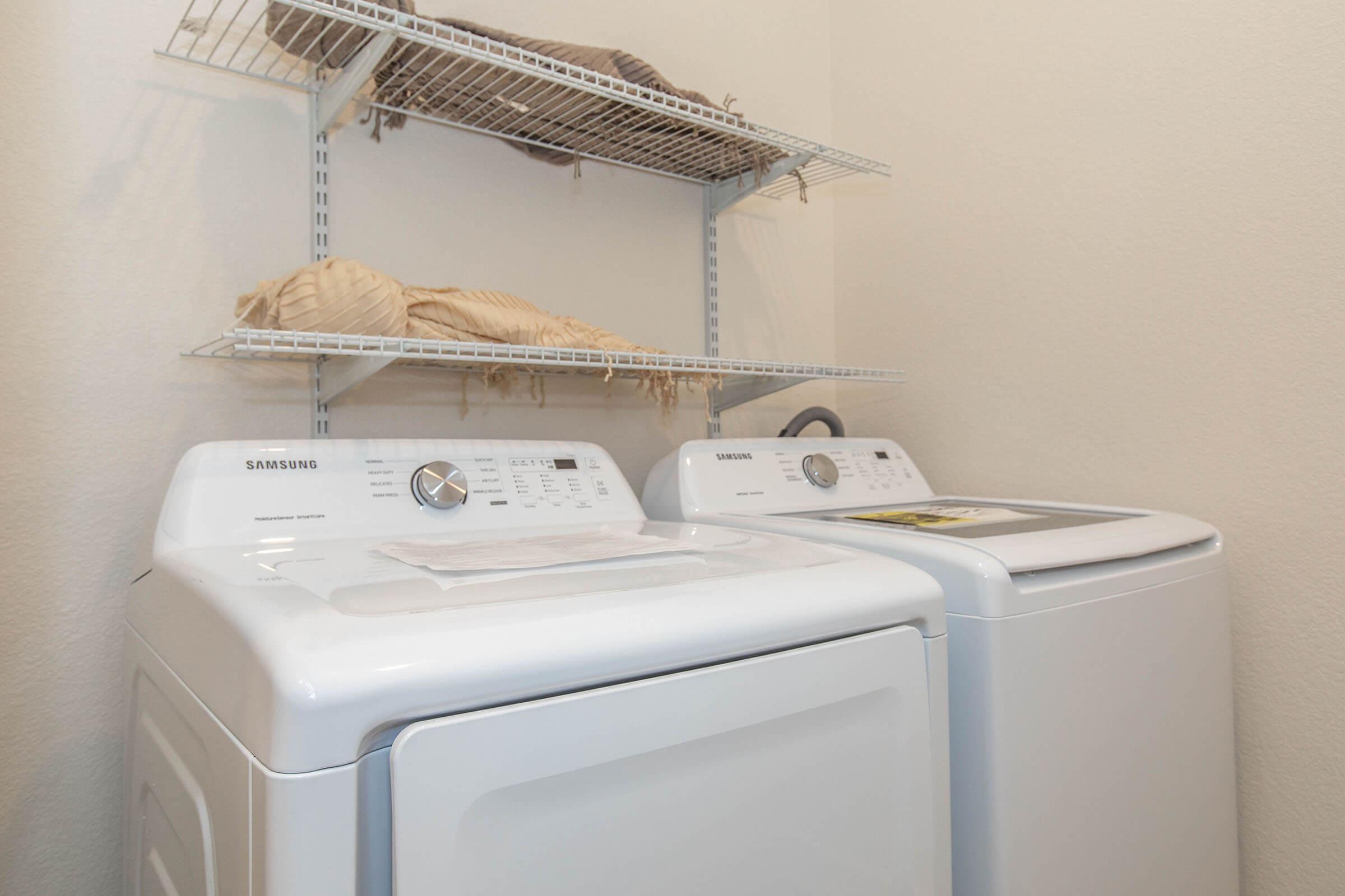 a toaster oven sitting on top of a refrigerator