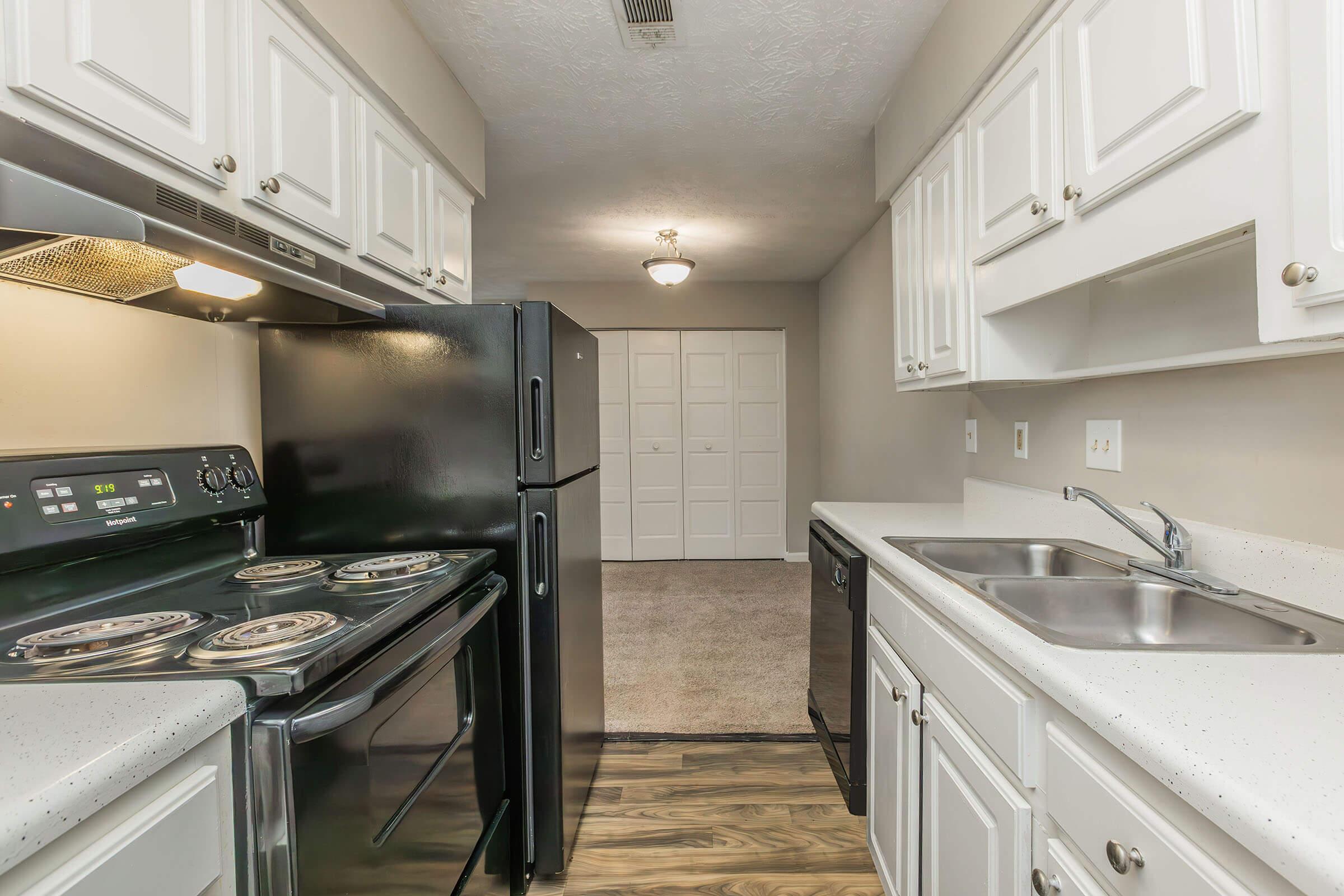 a modern kitchen with stainless steel appliances