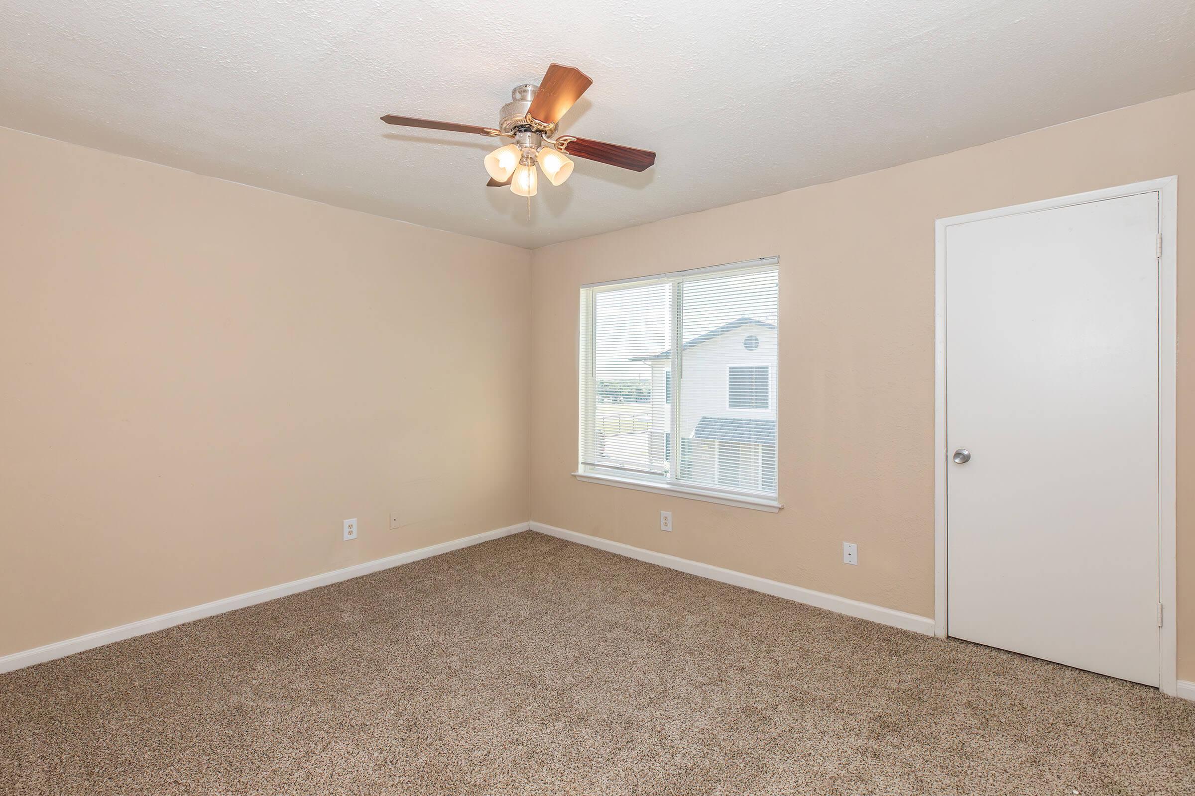 a room with a sink and a window