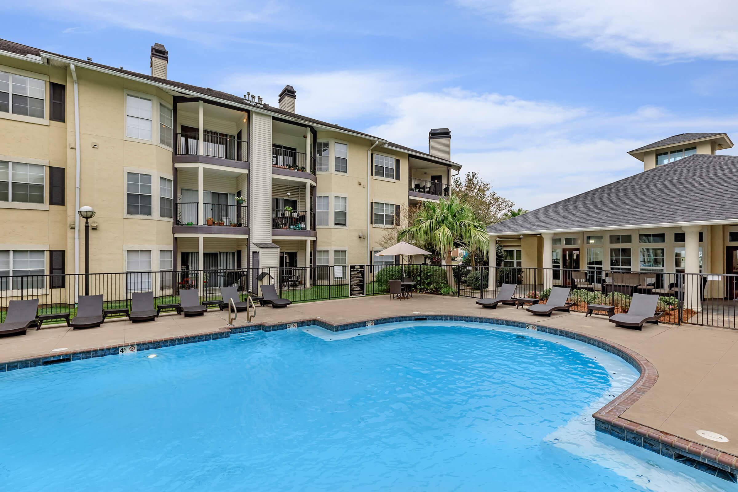 a house with a large pool of water